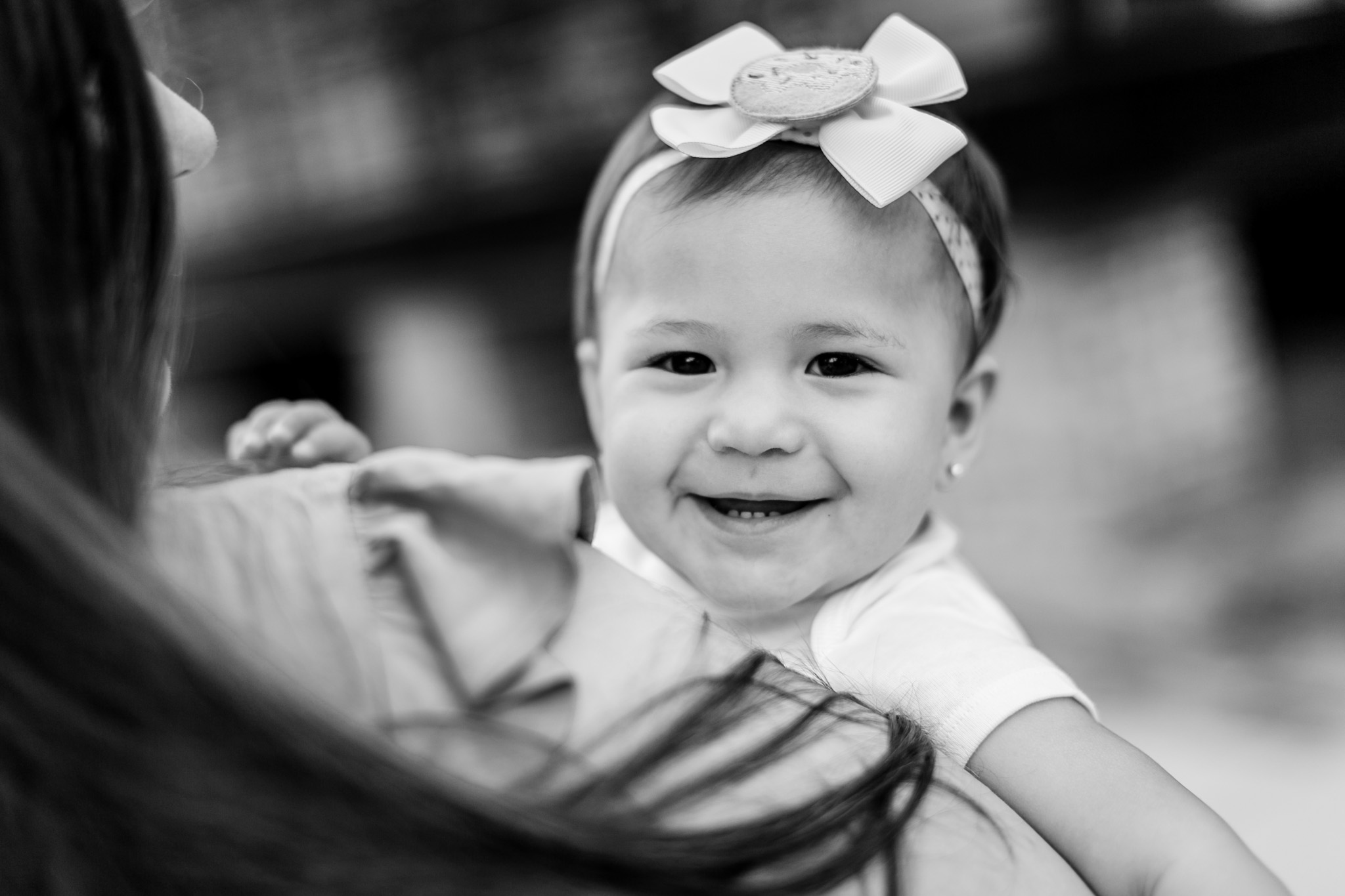 Black and white portrait of baby girl smiling | Durham Photographer | By G. Lin Photography