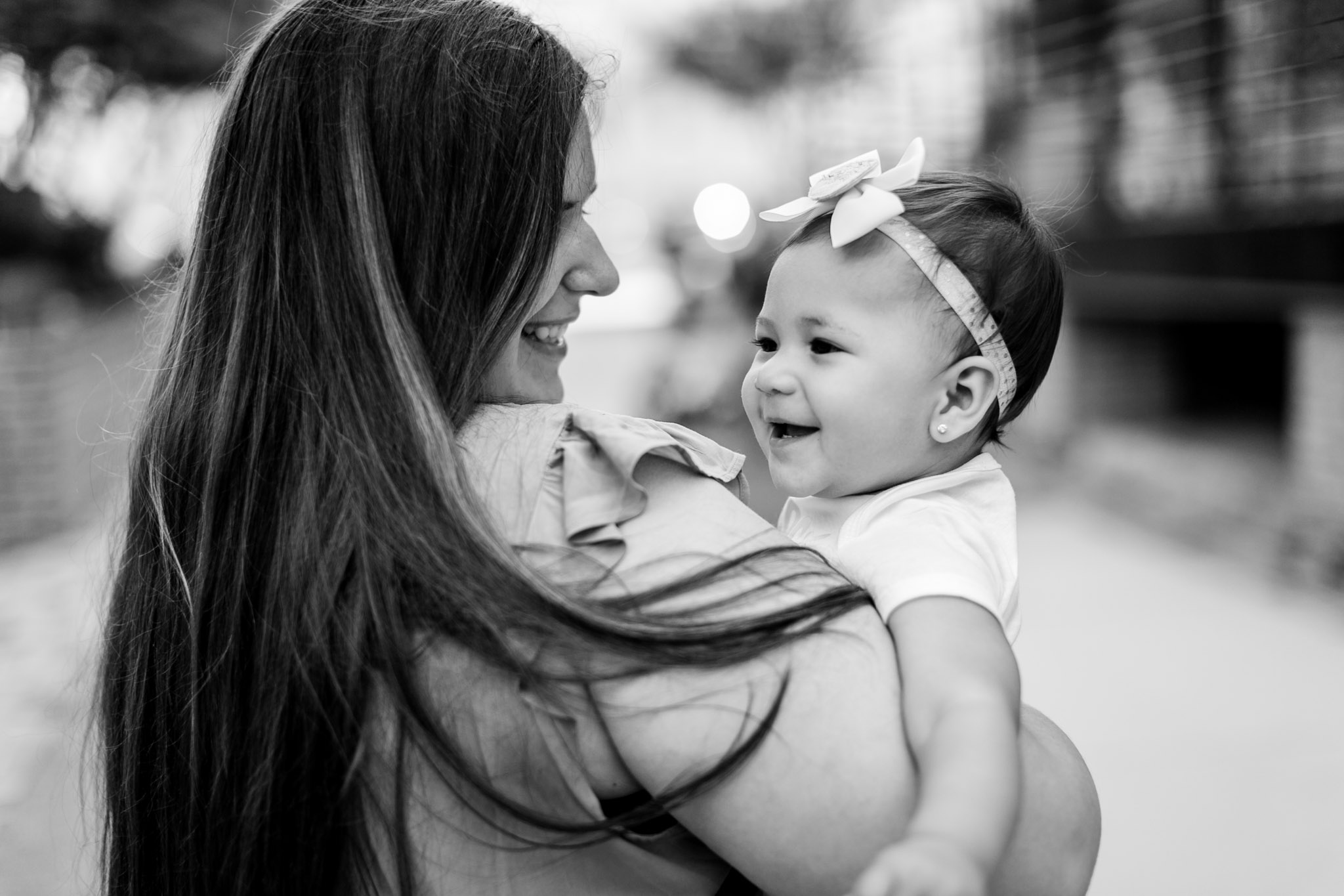 Candid black and white photo of mother and daughter | Durham Photographer | By G. Lin Photography Family and Lifestyle Portraits