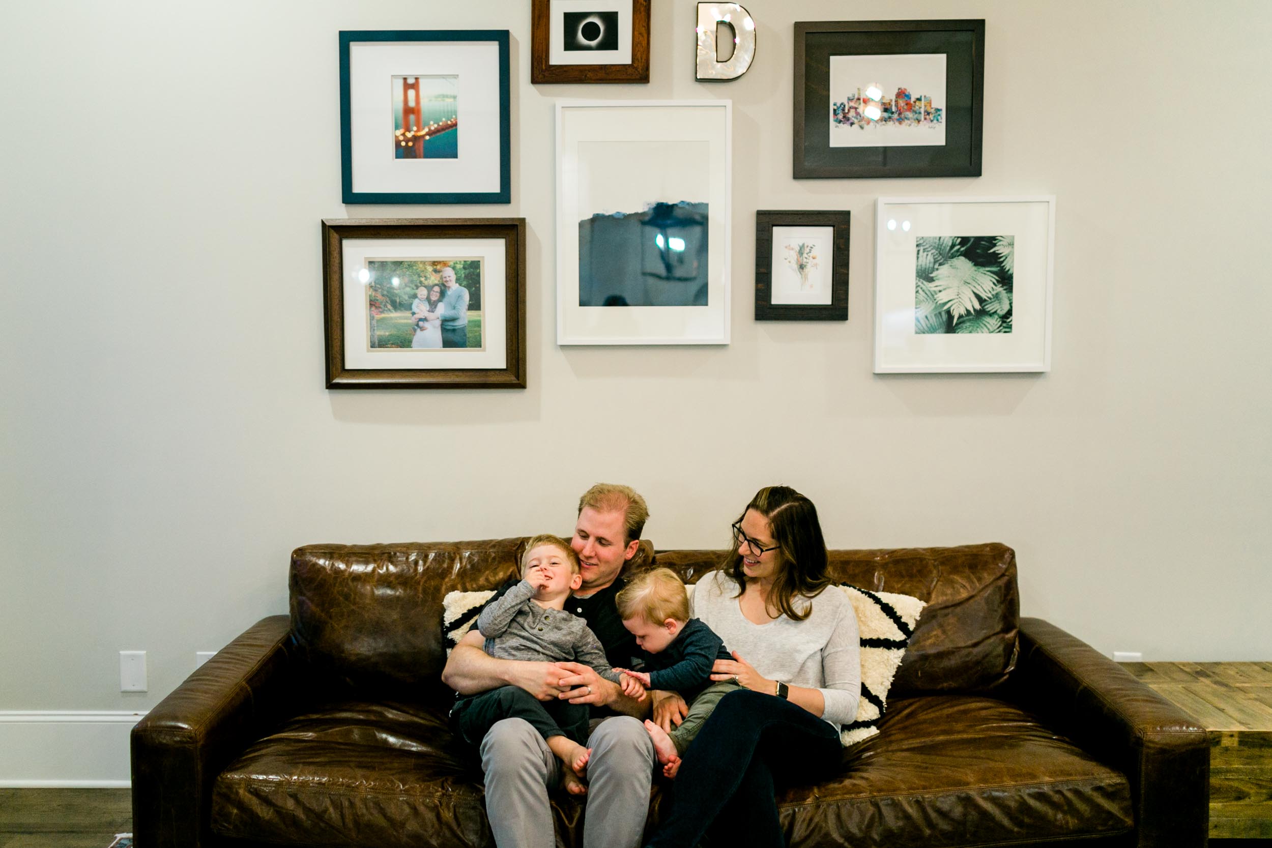 Family sitting on couch | Durham Photographer | By G. Lin Photography
