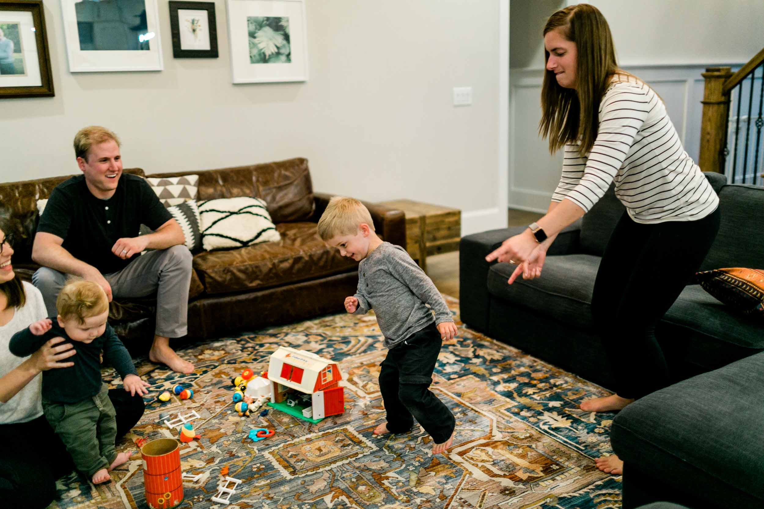 Family dancing together at home | Raleigh Family Photographer | By G. Lin Photography