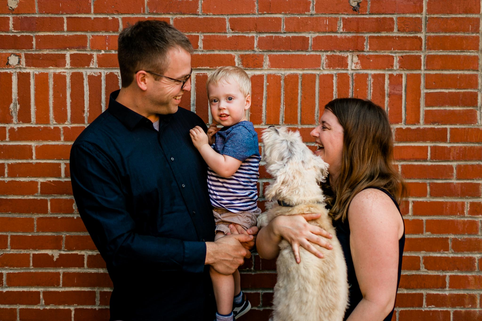 Durham Family Photographer | By G. Lin Photography | Candid lifestyle family photo at American Tobacco Campus