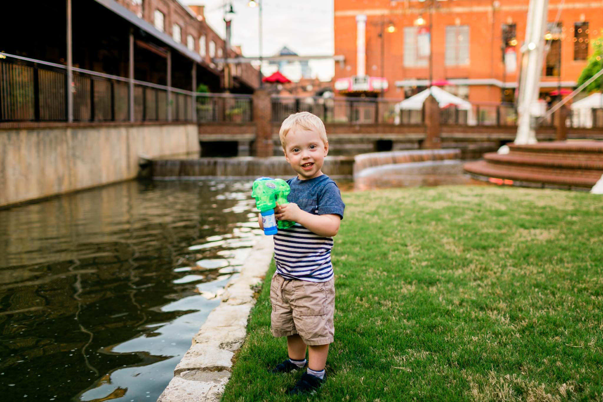 Boy smiling at camera | Durham Photographer | By G. Lin Photography