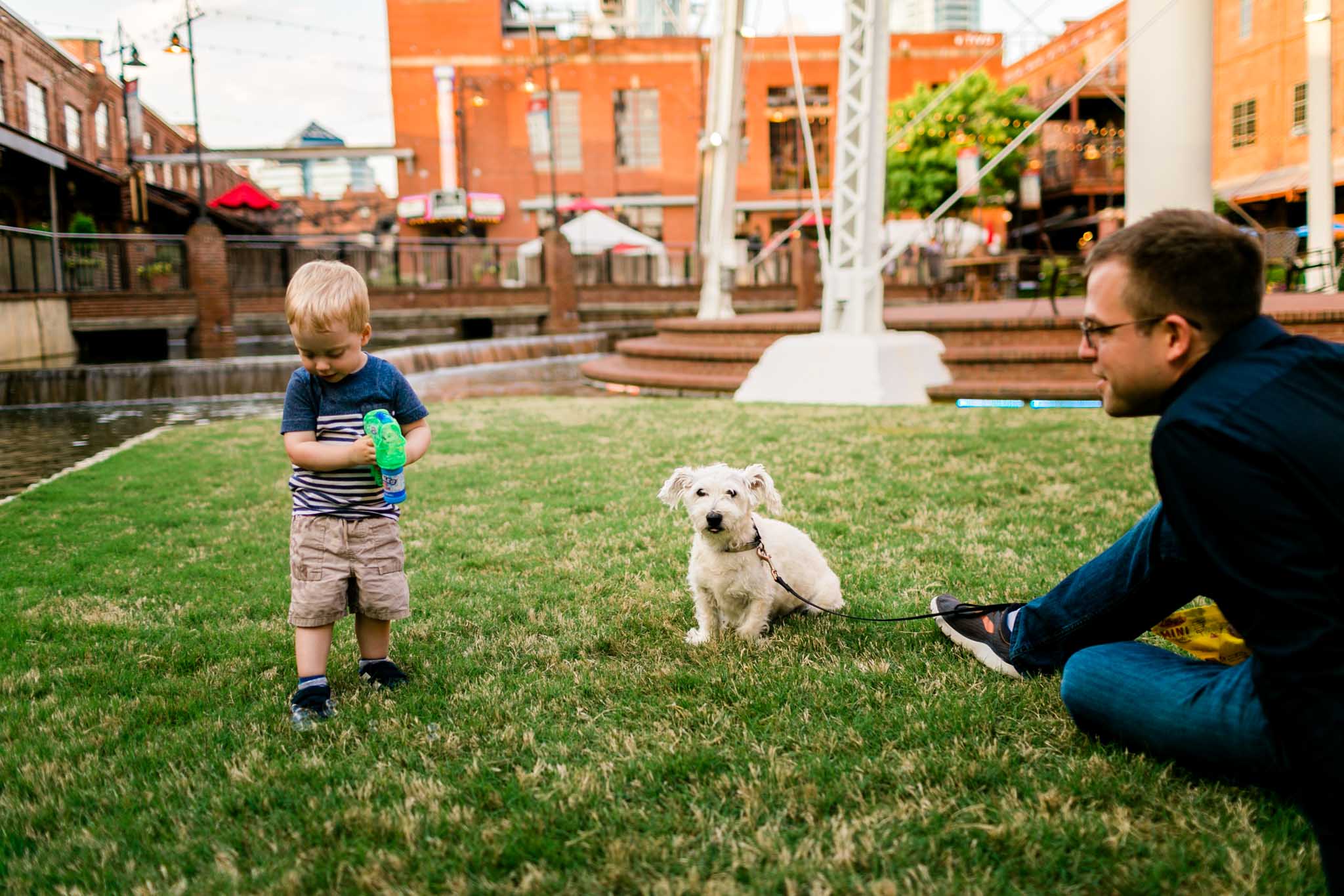 Candid lifestyle family photo at American Tobacco Campus | Durham Family Photographer | By G. Lin Photography