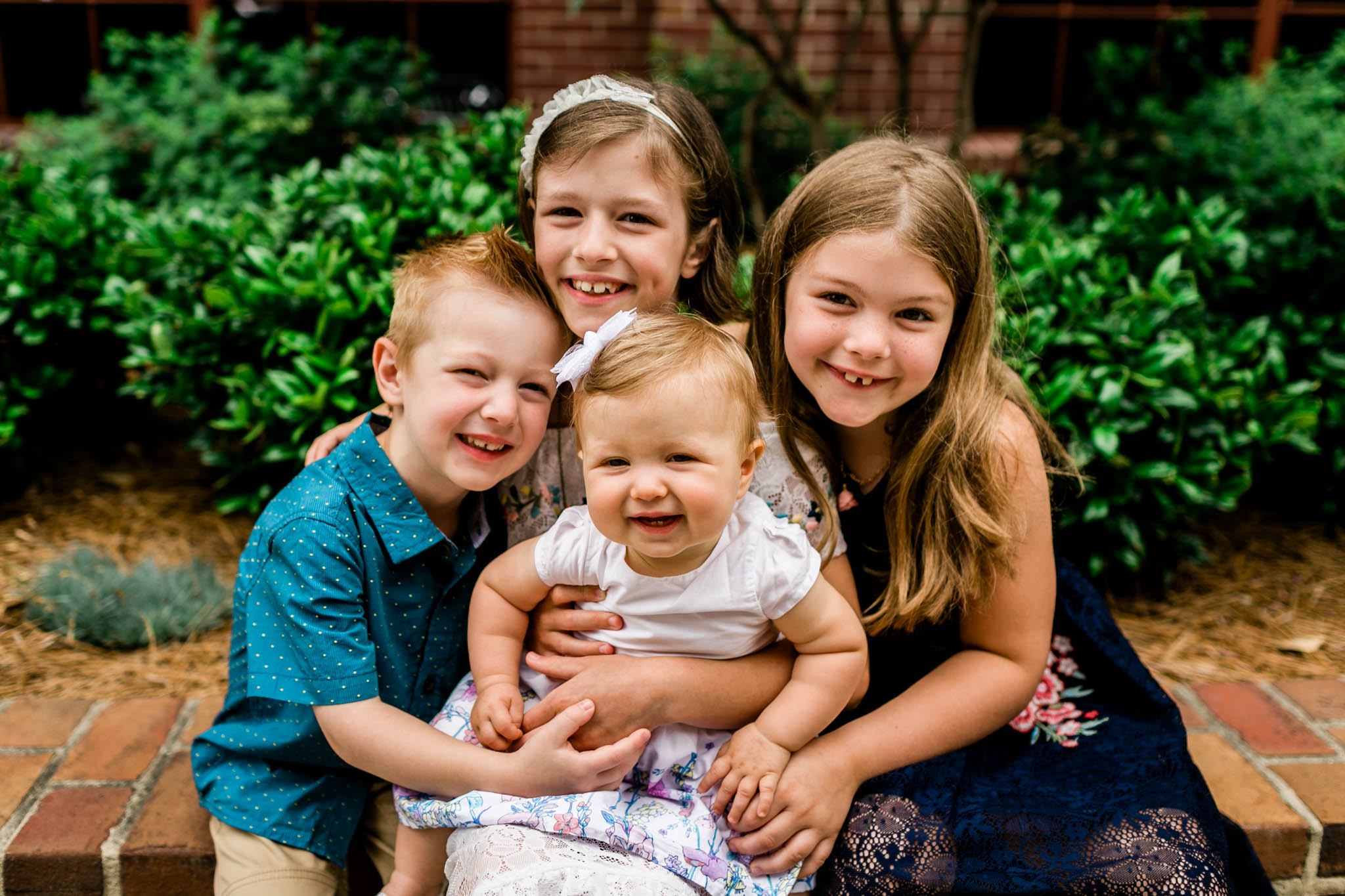 Durham Family Photographer | By G. Lin Photography | Beautiful sibling portrait outdoors at American Tobacco Campus