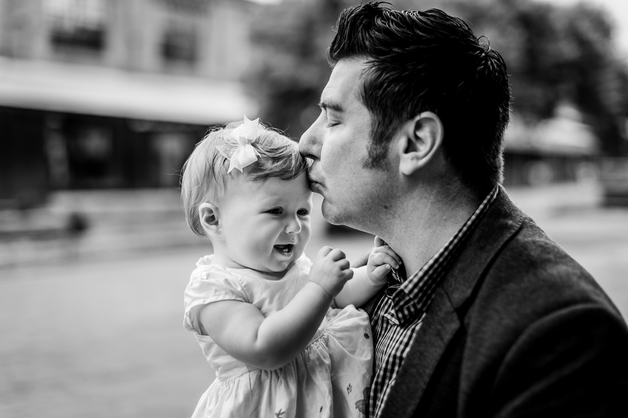 Durham Family Photographer | By G. Lin Photography | Father kissing baby girl on head