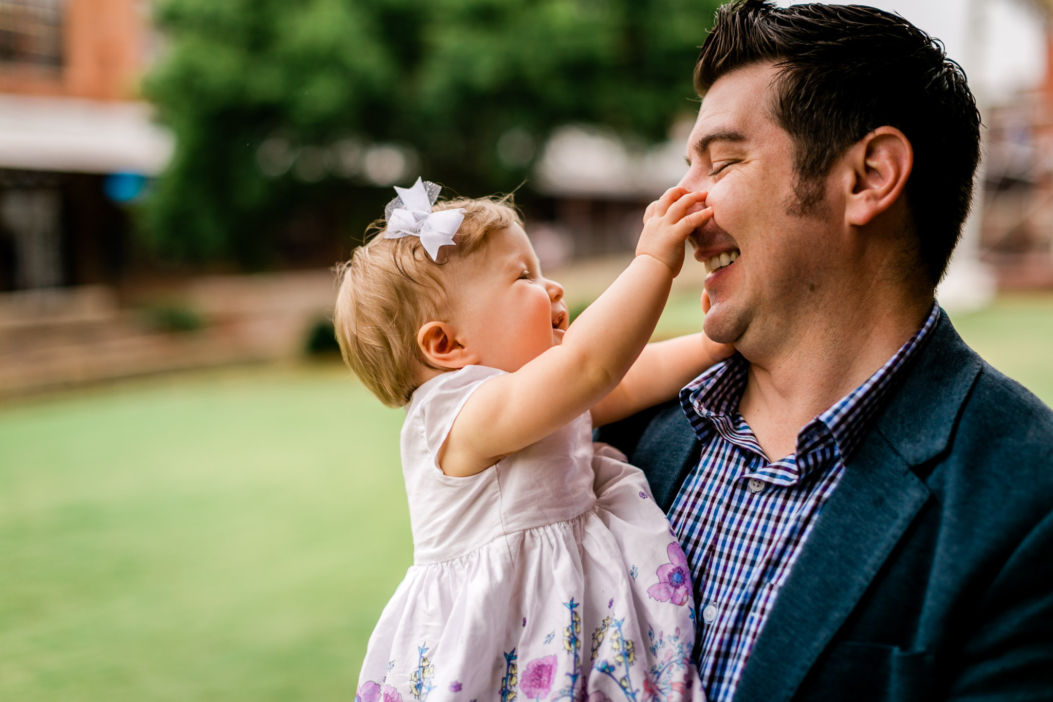 Durham Family Photographer | By G. Lin Photography | Baby girl pulling on dad's nose