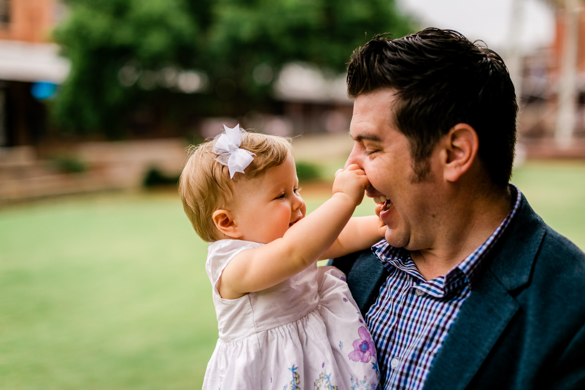 Durham Family Photographer | By G. Lin Photography | Baby girl pulling on dad's nose