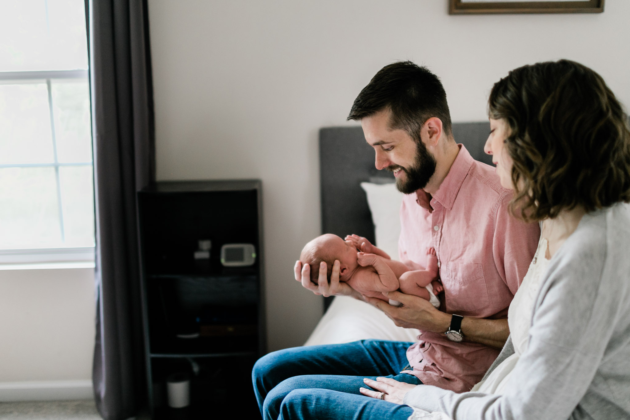 Durham Newborn Photographer | By G. Lin Photography | Father holding baby son in bedroom