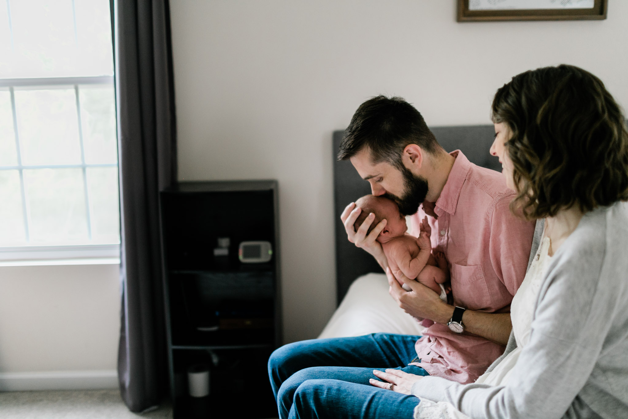 Durham Newborn Photographer | By G. Lin Photography | Father giving kiss on son's head