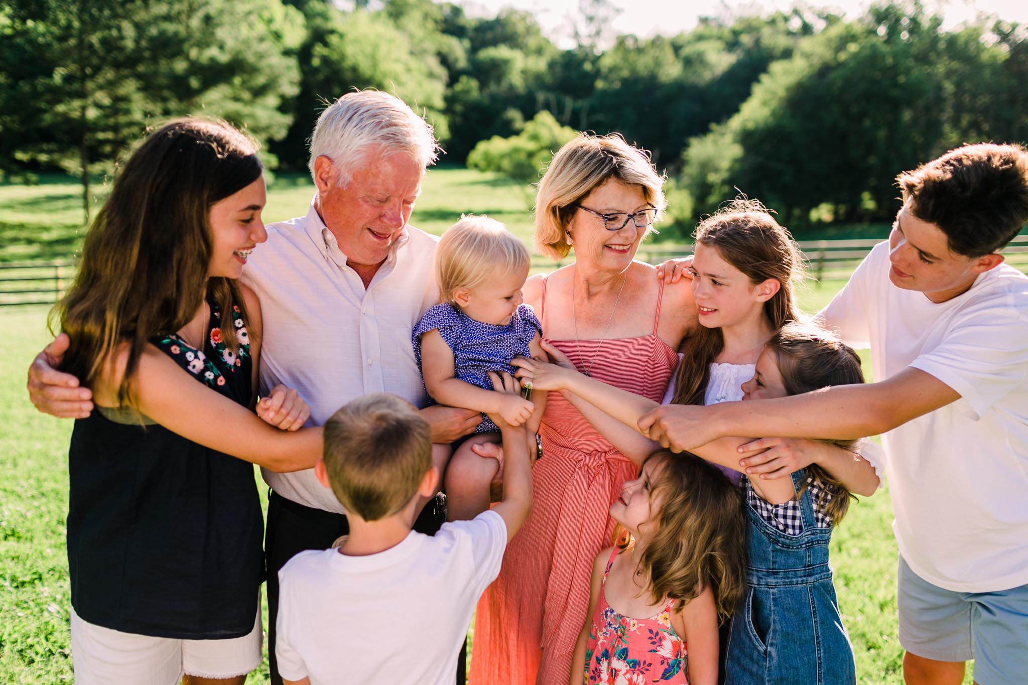 Durham Family Photographer | By G. Lin Photography | Candid photo of grandparents with grandkids outdoors