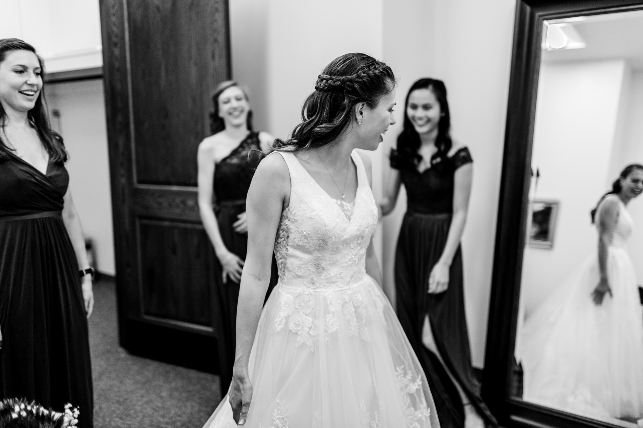 Black and white photo of bride looking in mirror | Durham Wedding Photographer | By G. Lin Photography