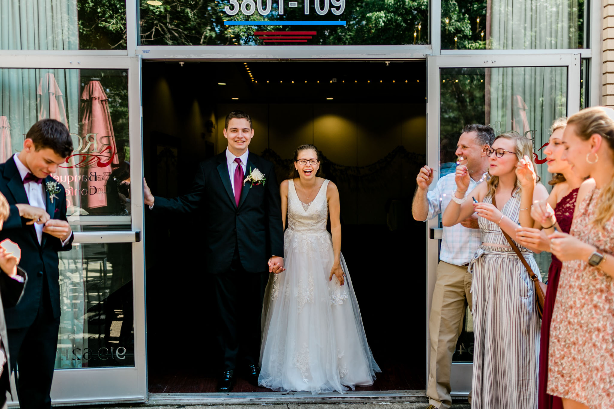 Bride and groom ready for sendoff | Royal Banquet Conference Center | Raleigh Wedding Photographer | By G. Lin Photography