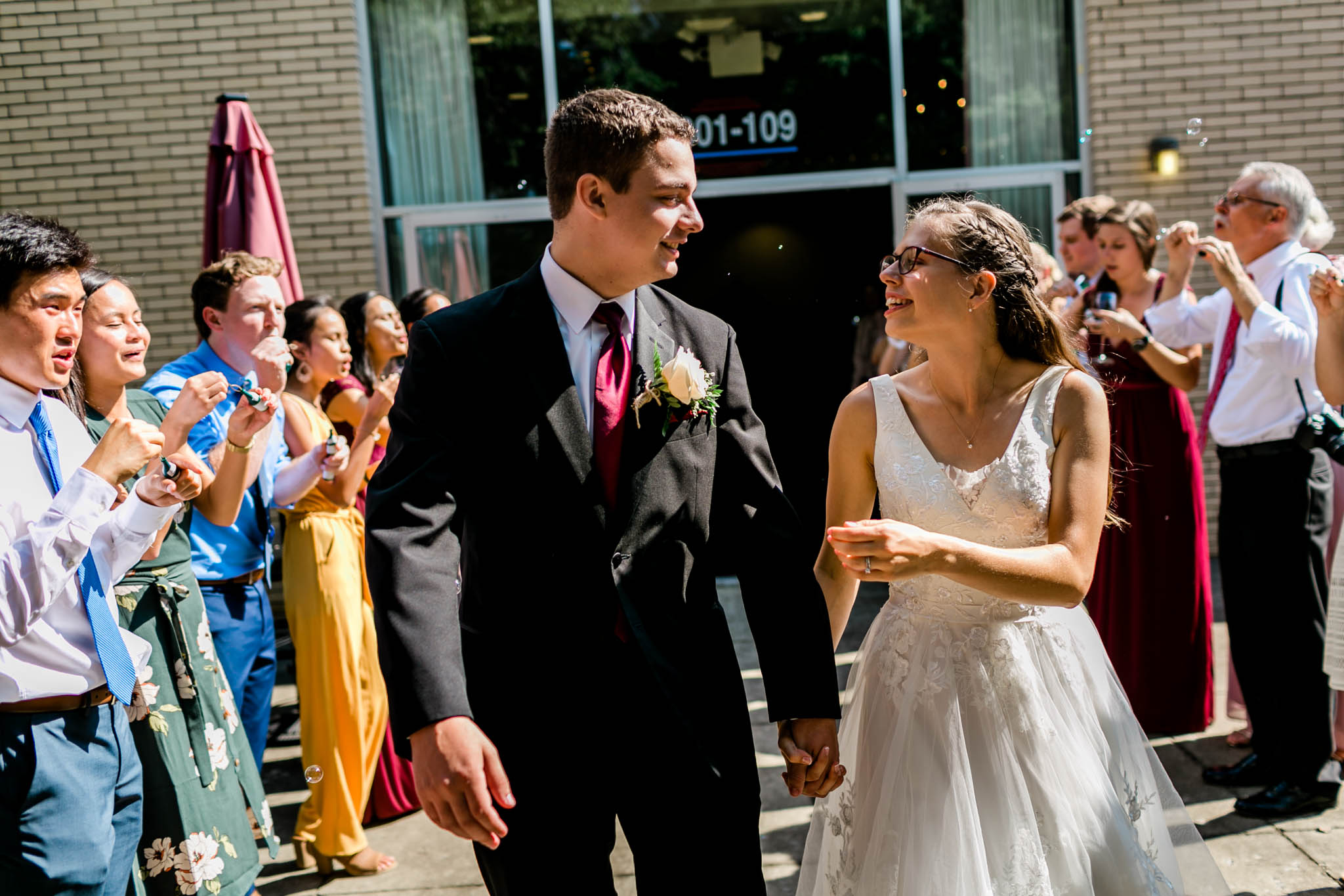 Bride and groom laughing | Royal Banquet Conference Center | Raleigh Wedding Photographer | By G. Lin Photography