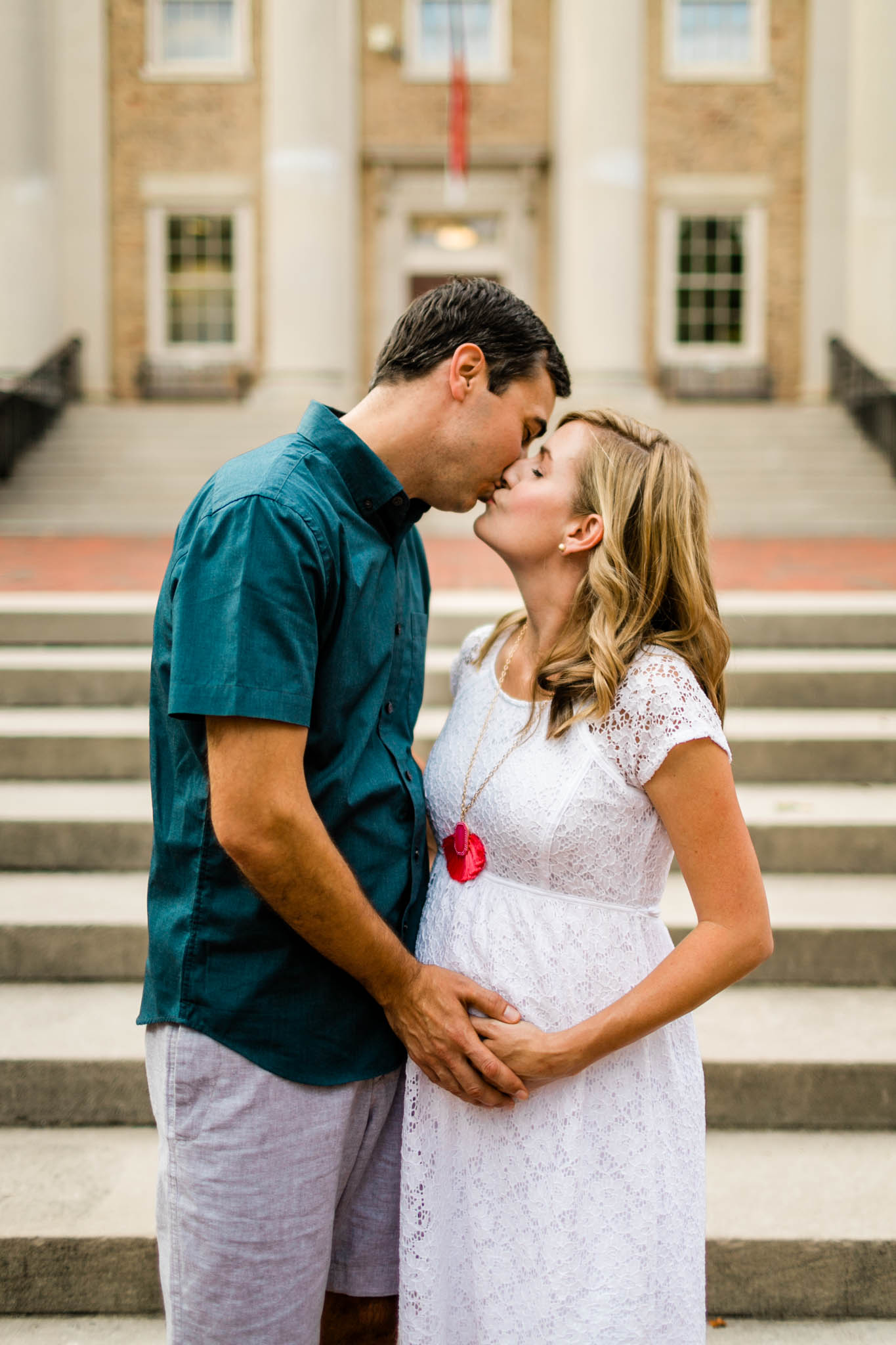 Maternity Photography at UNC Campus | By G. Lin Photography | South Building | Couple kissing