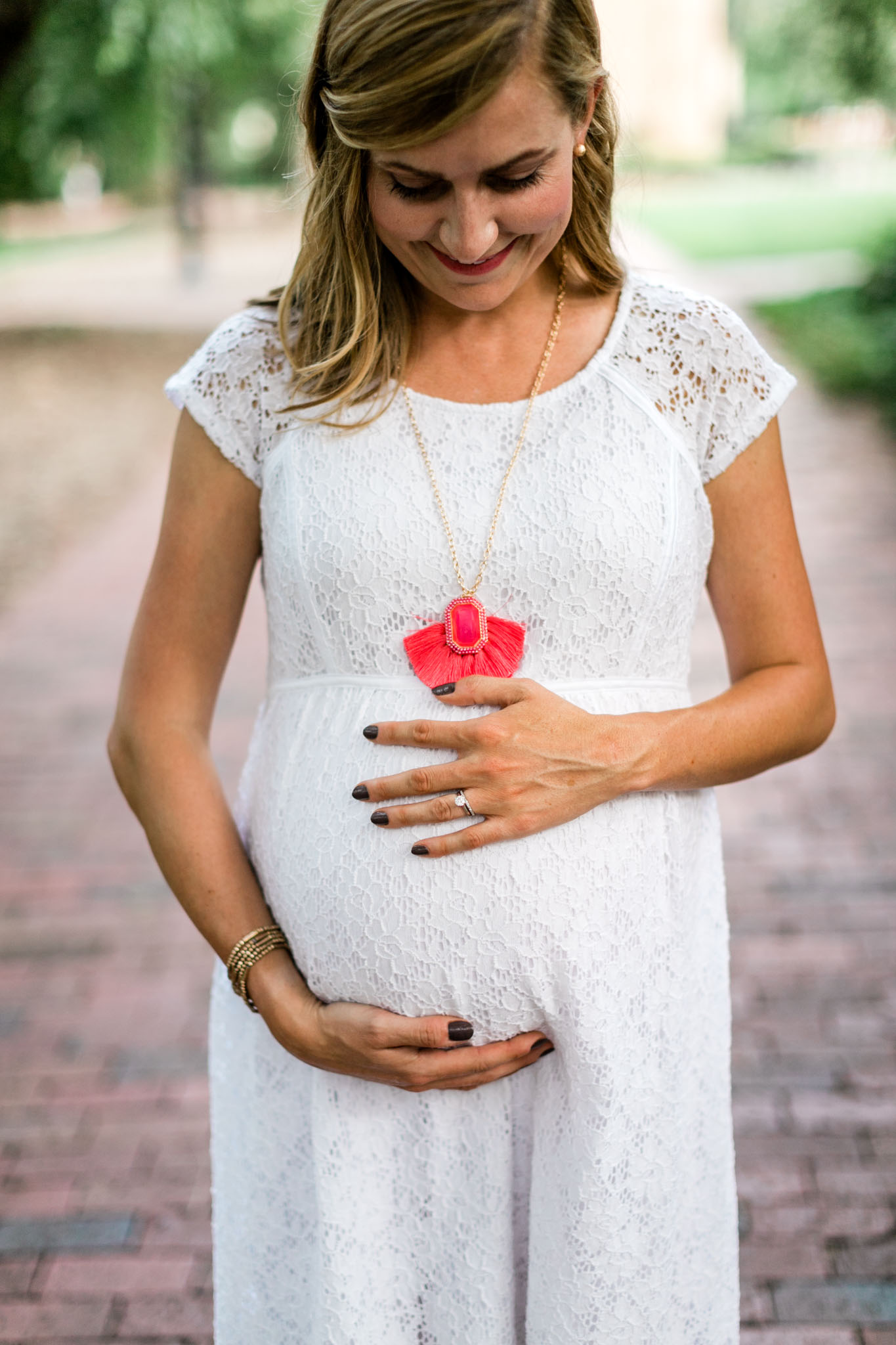 Close up portrait of mom holding baby belly | UNC Chapel Hill | Maternity Photographer | By G. Lin Photography