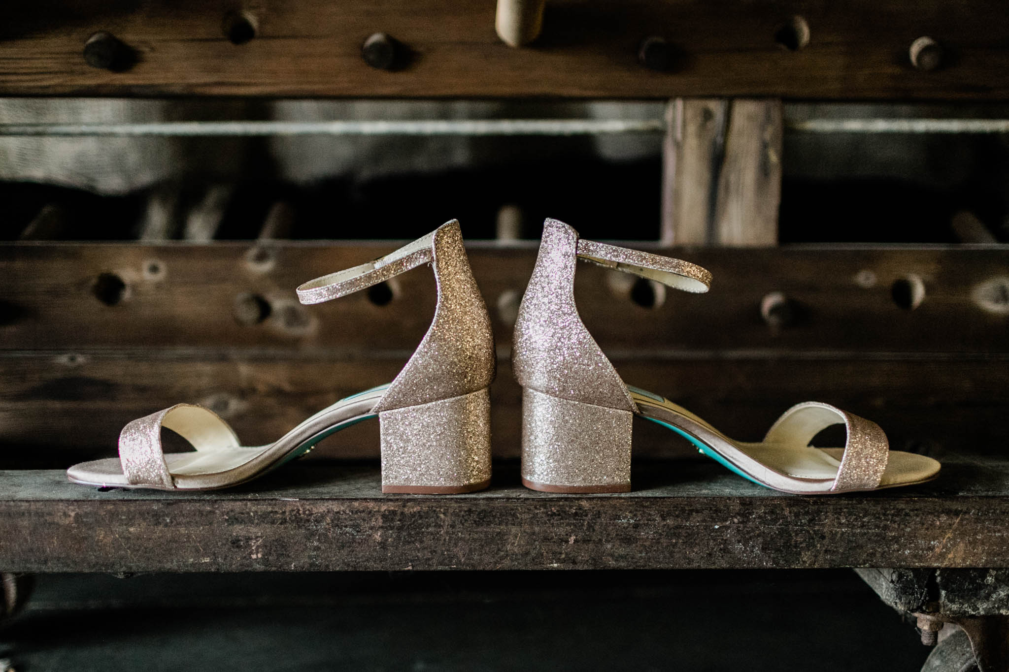 Haw River Ballroom Wedding | Durham Photographer | By G. Lin Photography | Wedding Shoes on wooden shelf