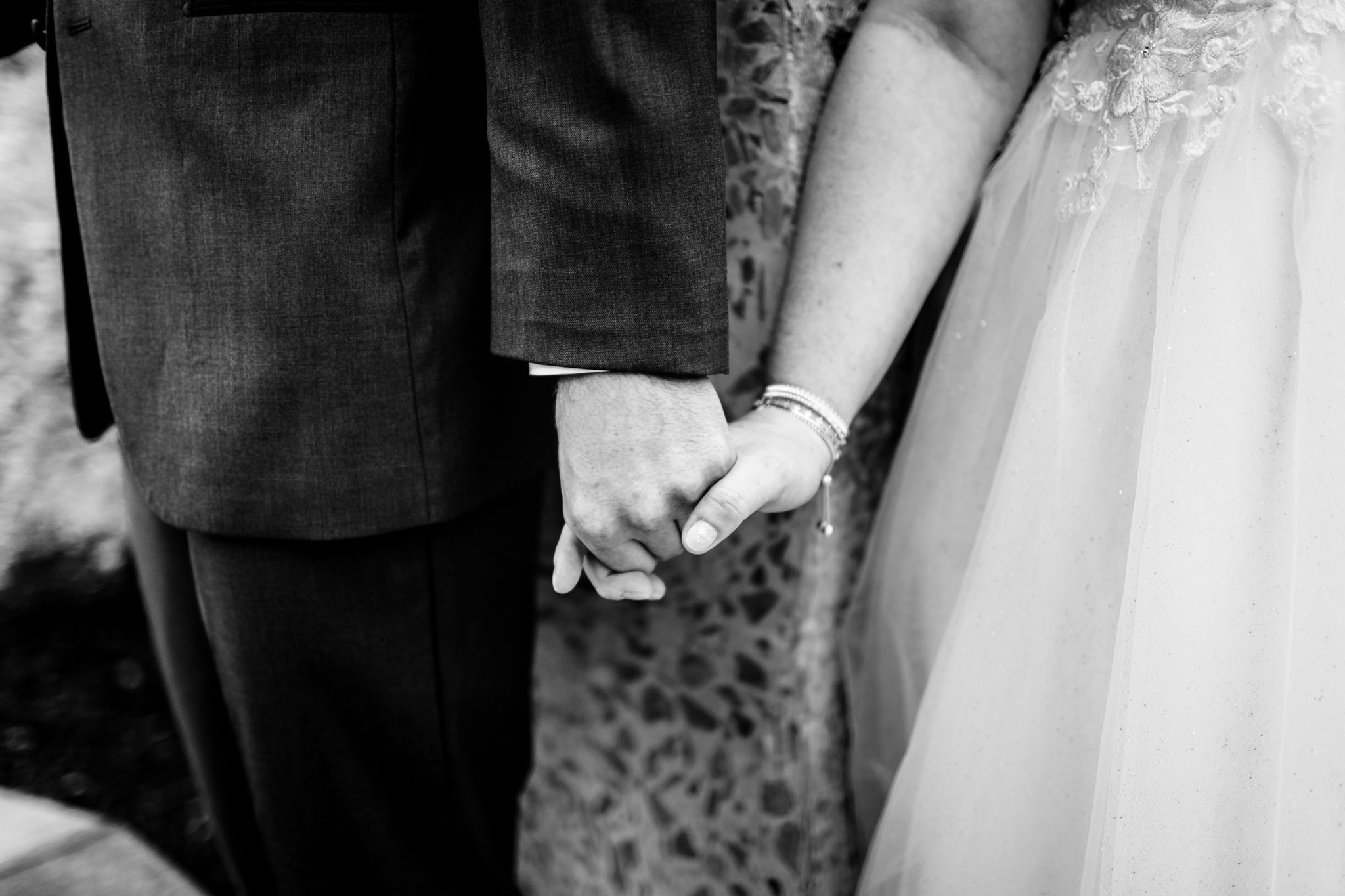 Haw River Ballroom Wedding | Durham Photographer | By G. Lin Photography | Black and white photo of bride and groom holding hands