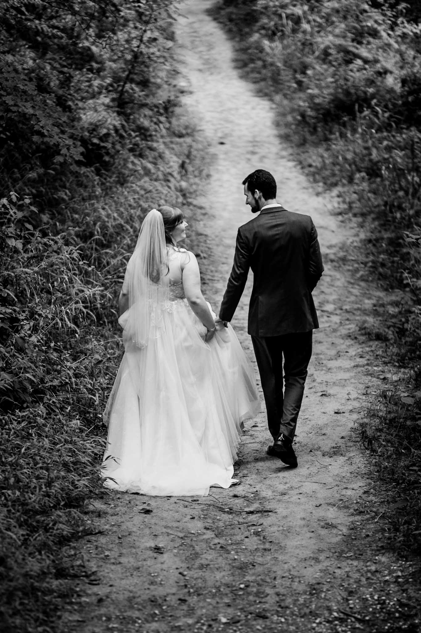 Haw River Ballroom Wedding | Durham Photographer | By G. Lin Photography | Bride and groom walking down path