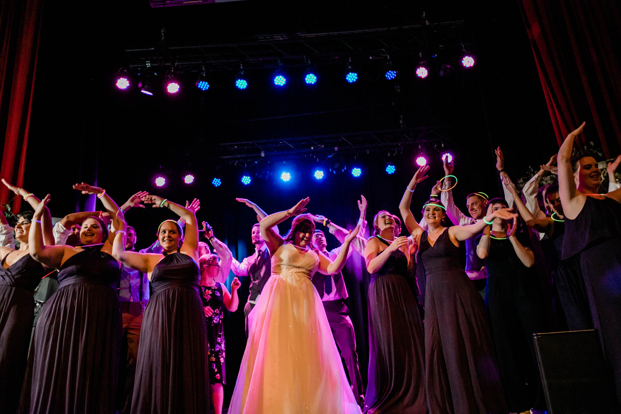 Haw River Ballroom Wedding | Durham Wedding Photographer | By G. Lin Photography | Bridesmaids dancing YMCA on stage