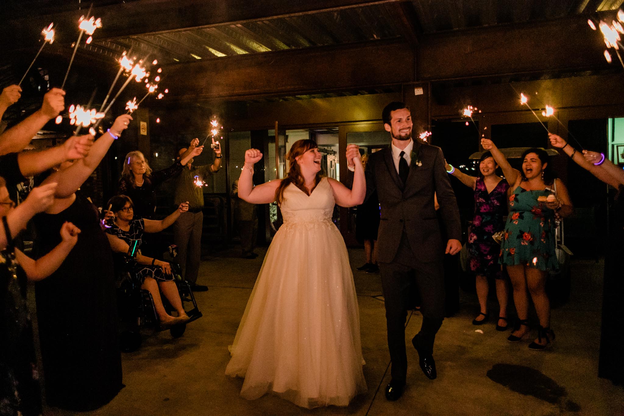 Haw River Ballroom Wedding | Durham Photographer | By G. Lin Photography | Bride and Groom laughing at sendoff