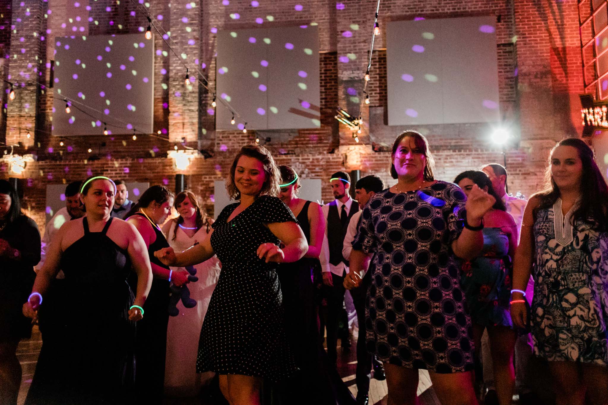 Haw River Ballroom Wedding | Durham Wedding Photographer | By G. Lin Photography | Women dancing at wedding reception