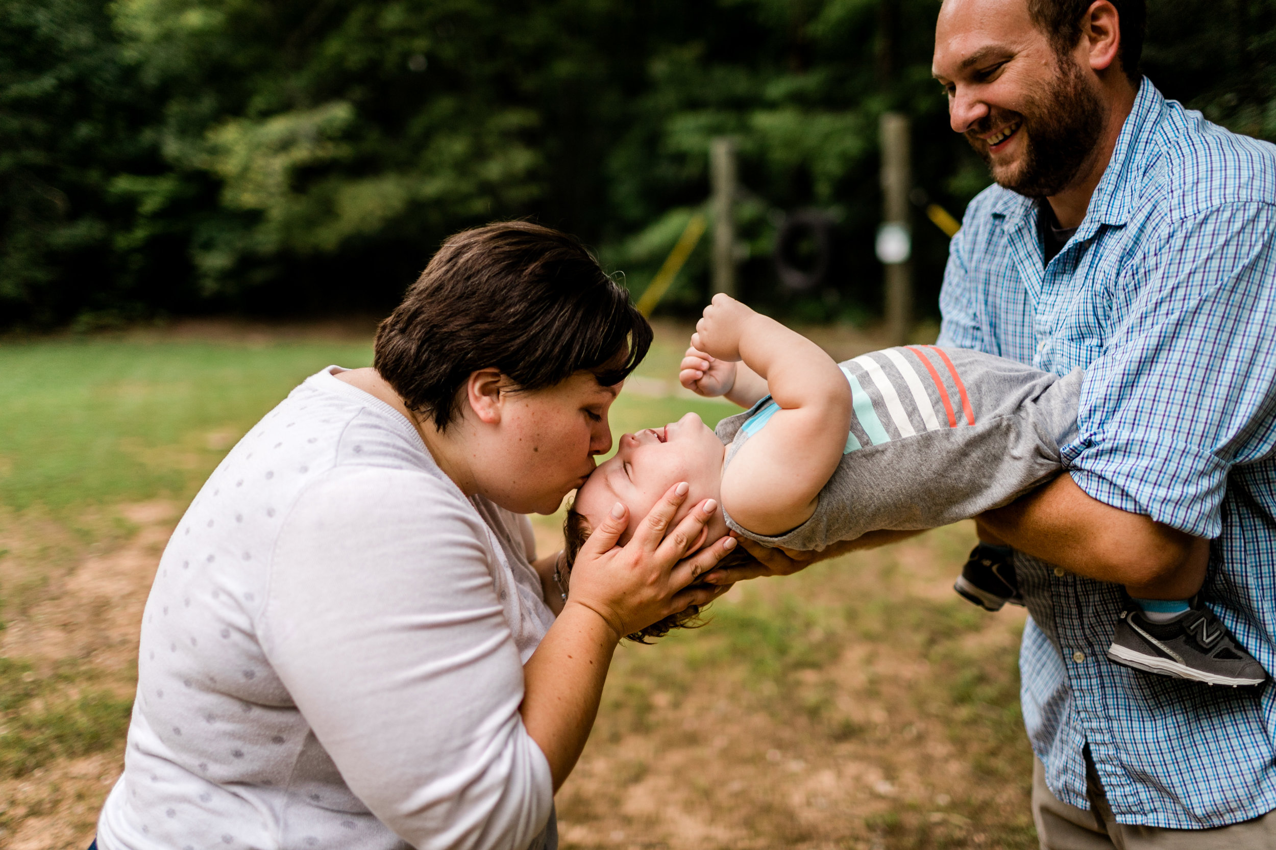 Durham Family Photographer | By G. Lin Photography | Mom kissing son on head