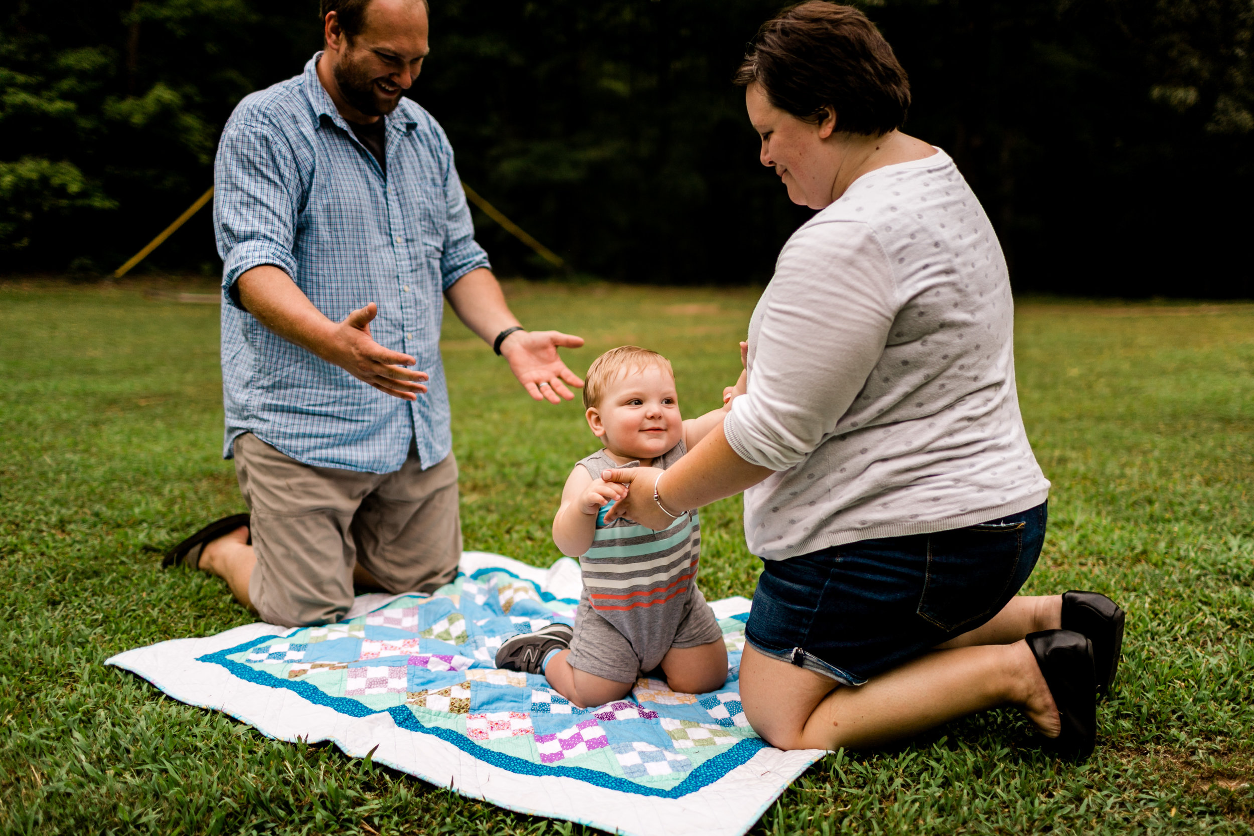 Durham Family Photography at Spurce Pine Lodge | By G. Lin Photography | Family on blanket outside