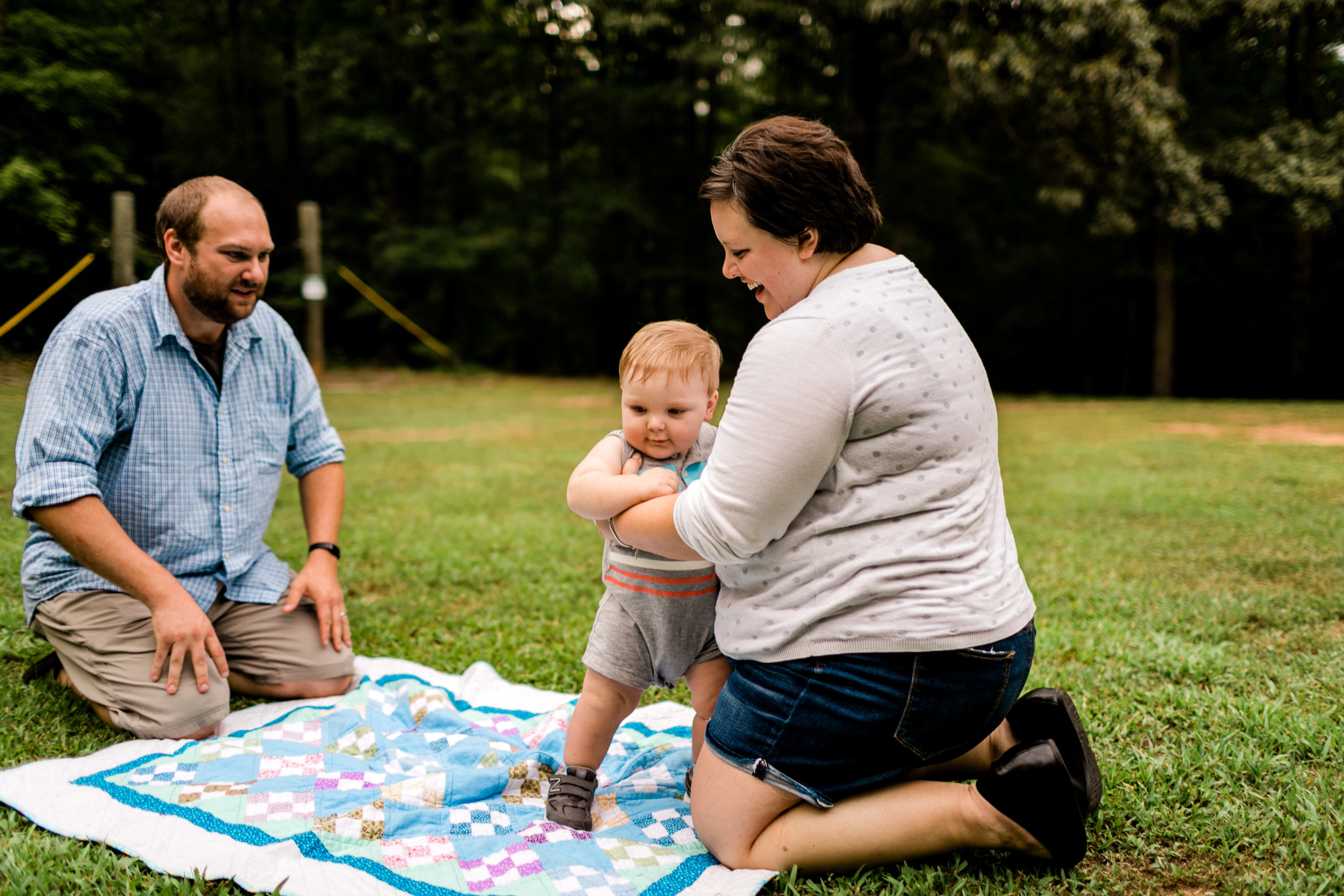 Durham Family Photographer | By G. Lin Photography | Mom holding up son learning to walk