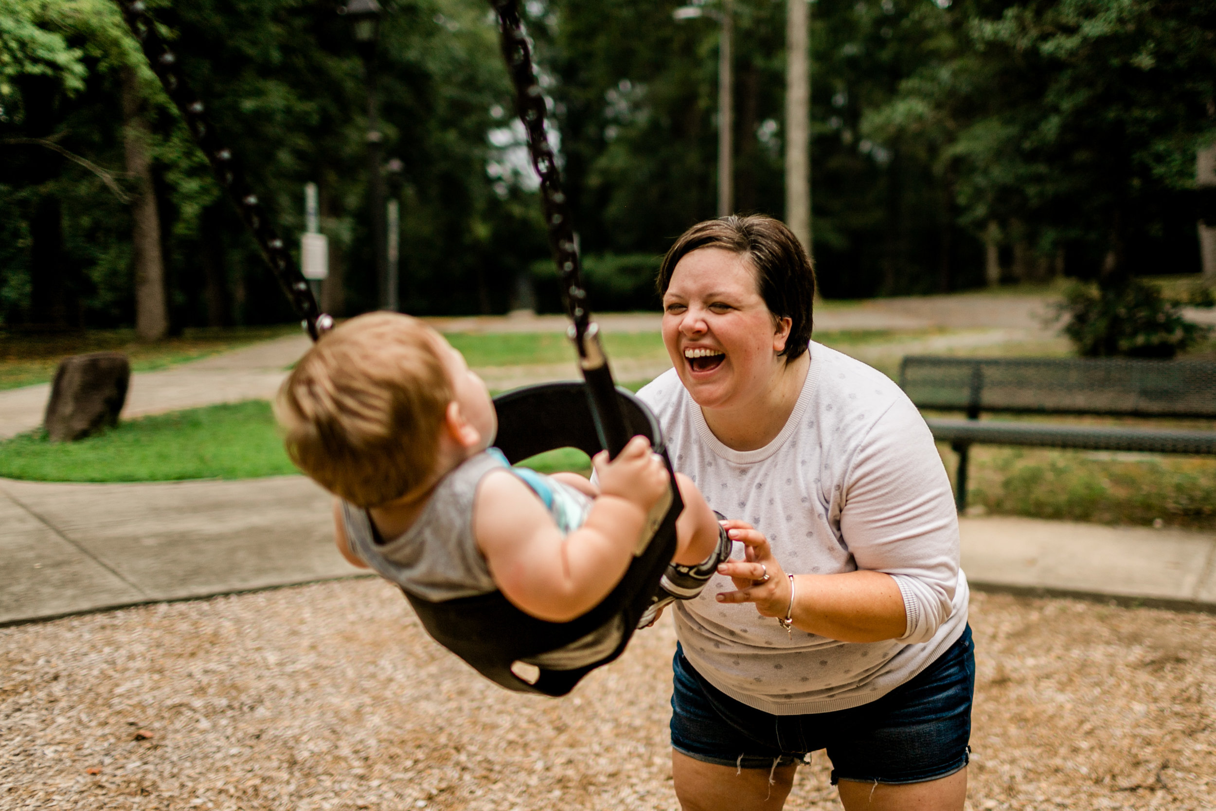 Durham Family Photographer | By G. Lin Photography | Mom laughing and swinging son 