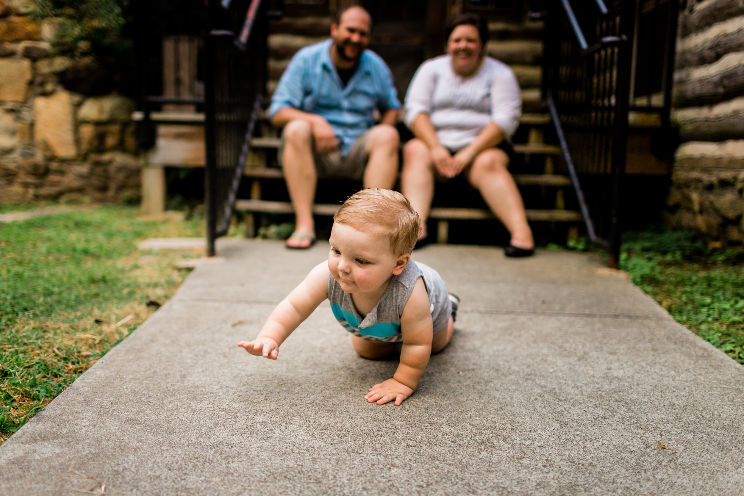 Baby crawling on ground | Portraits at Spruce Pine Lodge | Durham Family Photographer | By G. Lin Photography