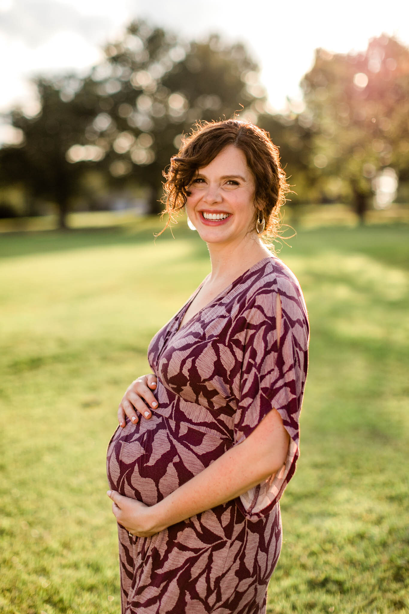 Dorothea Dix Park Maternity Photography | Raleigh Maternity Photographer | By G. Lin Photography | Mom holding baby belly