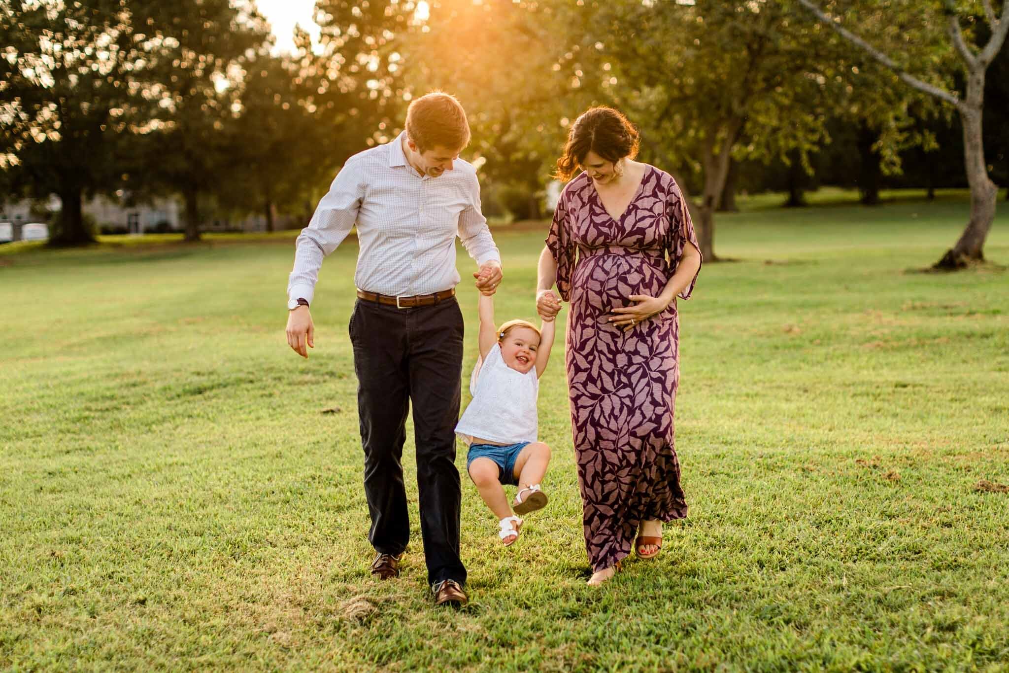 Raleigh Family Photographer | By G. Lin Photography | Family walking outside at Dix Park at sunset