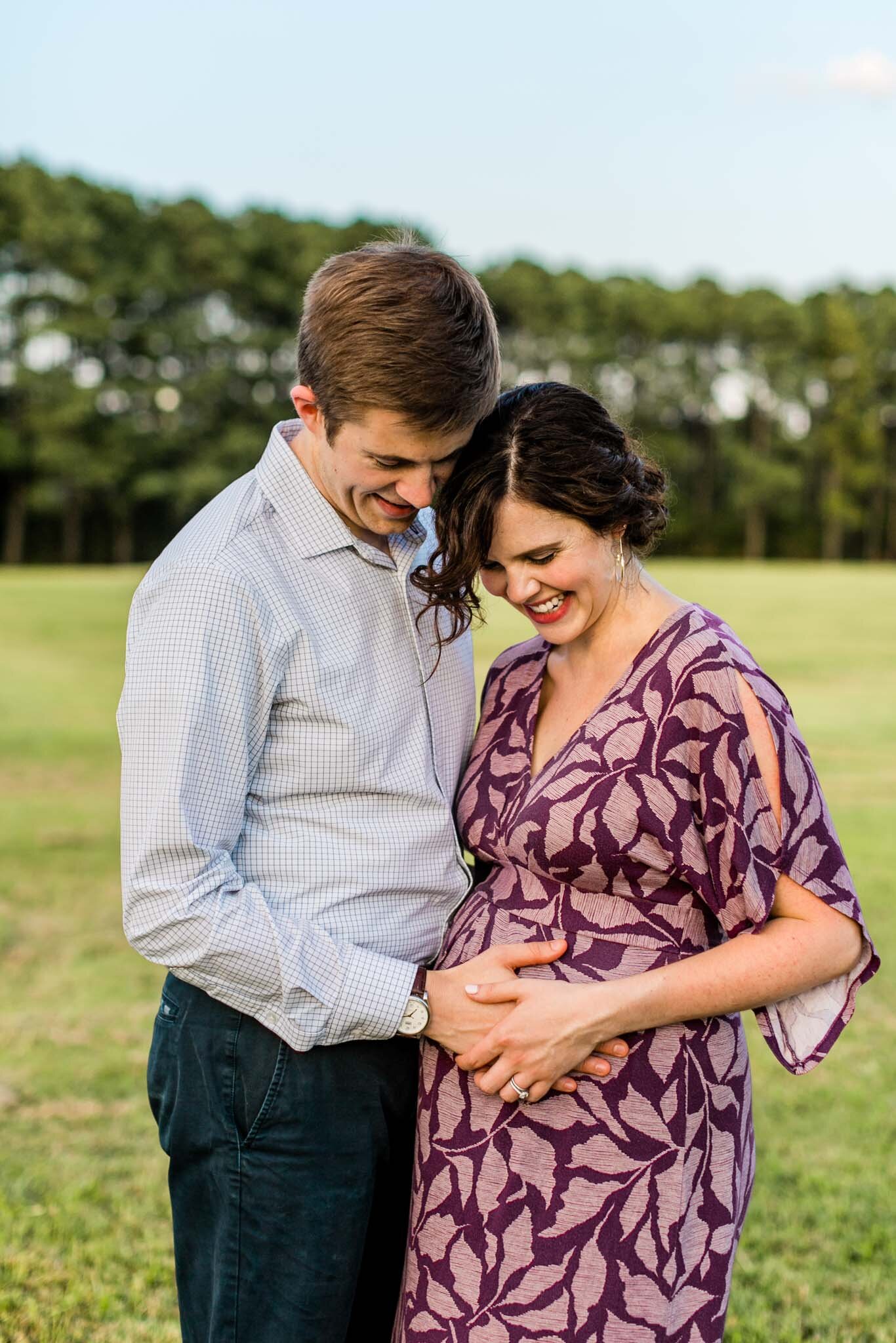 Raleigh Maternity Photographer | By G. Lin Photography | Parents smiling at baby bump