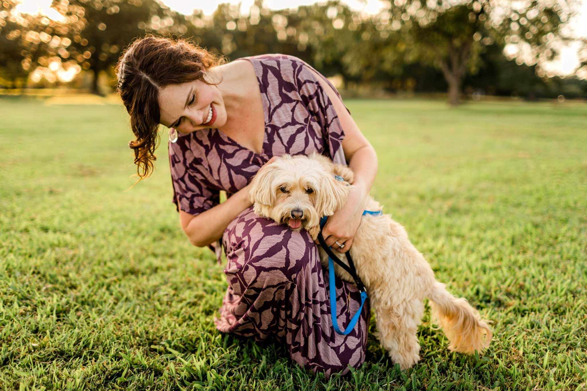 Raleigh Maternity Photographer | By G. Lin Photography | Woman petting dog at Dix Park