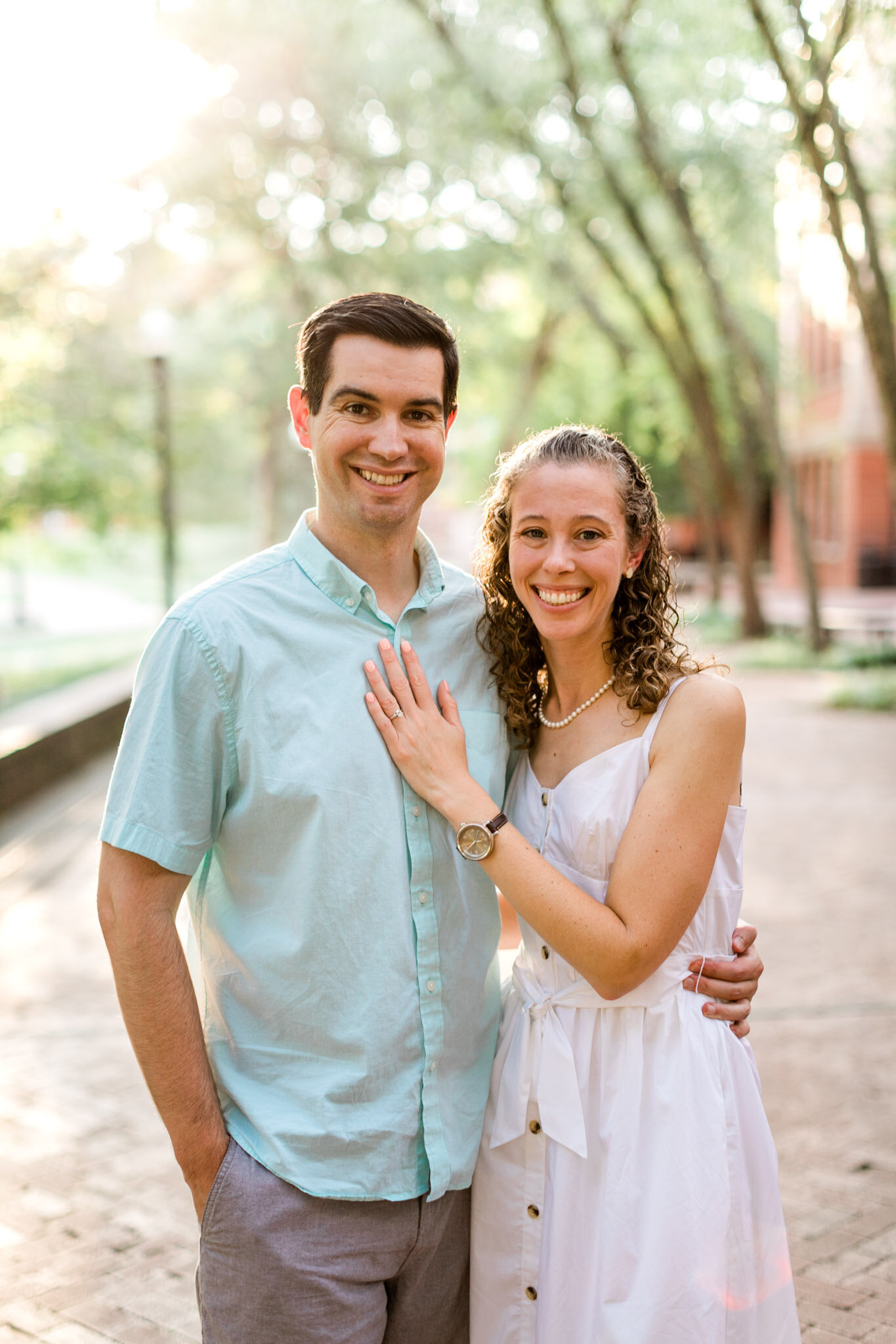 Raleigh Engagement Photographer | NC State University | By G. Lin Photography | Couple smiling in front of camera