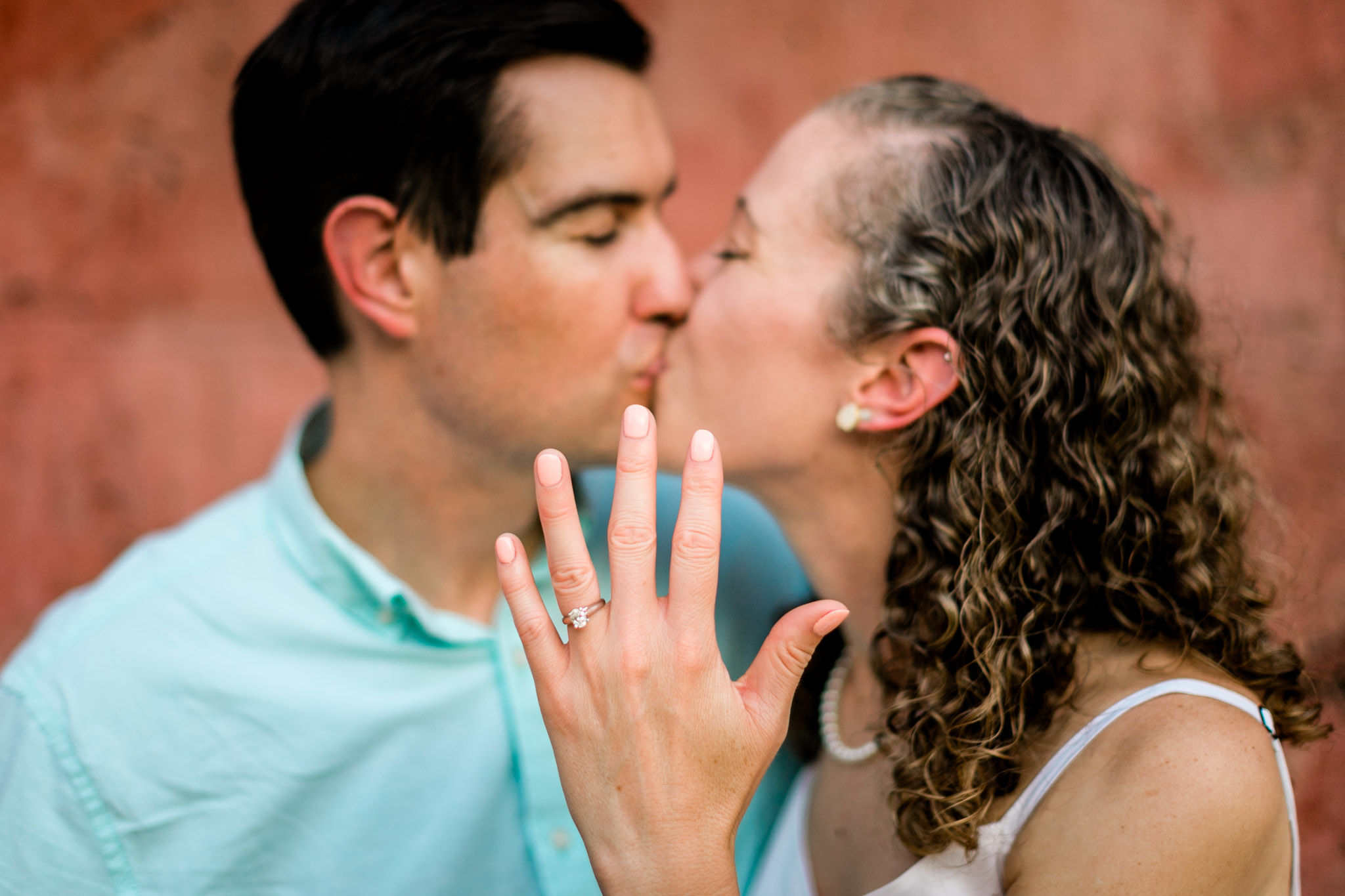 Raleigh Engagement Photographer | NC State University | By G. Lin Photography | Woman holding hand up with engagement ring