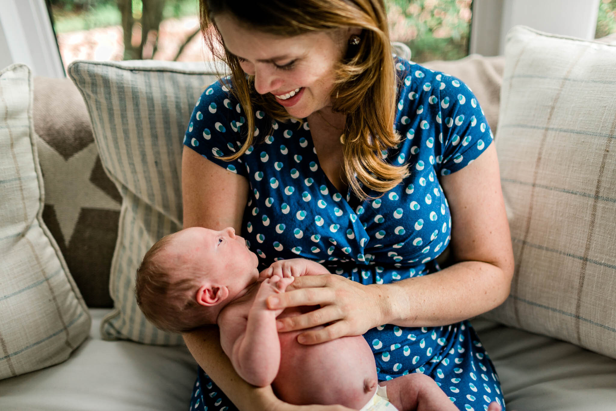 Durham Newborn Photographer | By G. Lin Photography | Mother holding baby in her arms