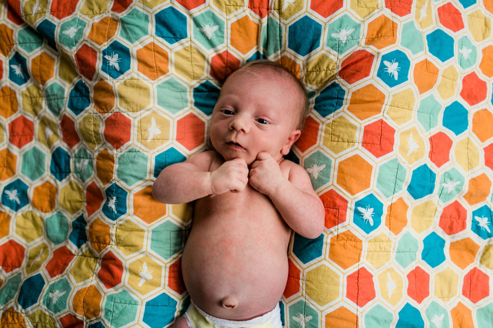 Durham Newborn Photographer | By G. Lin Photography | Newborn baby boy laying on quilt