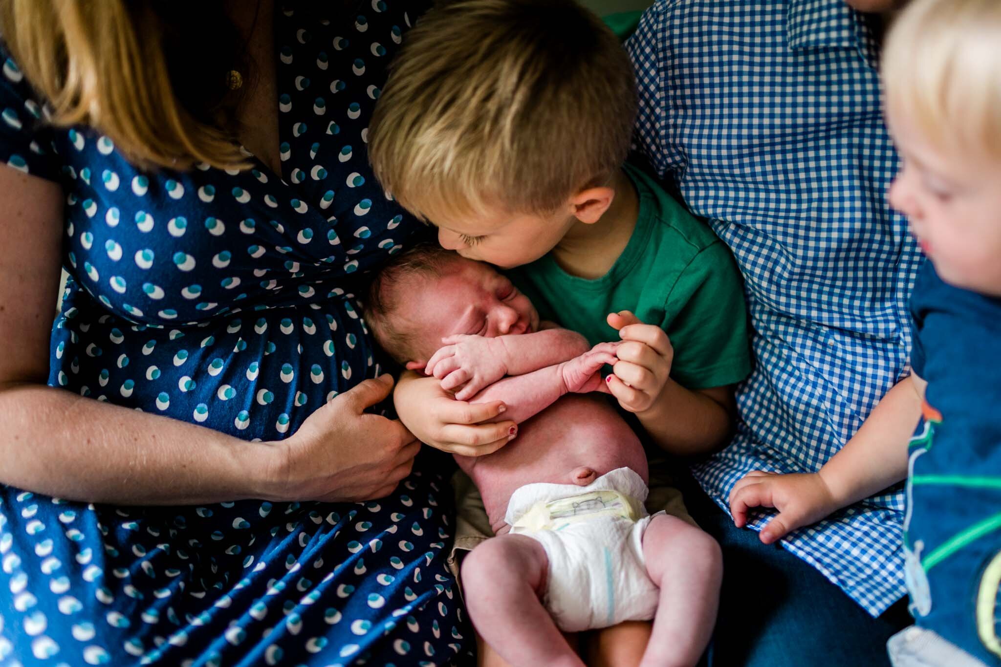 Durham Newborn Photographer | By G. Lin Photography | brother kissing baby brother