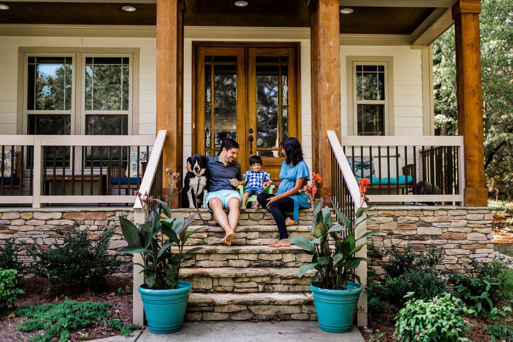 Raleigh Family Photographer | By G. Lin Photography | Family sitting on steps of home | Lifestyle family photography session