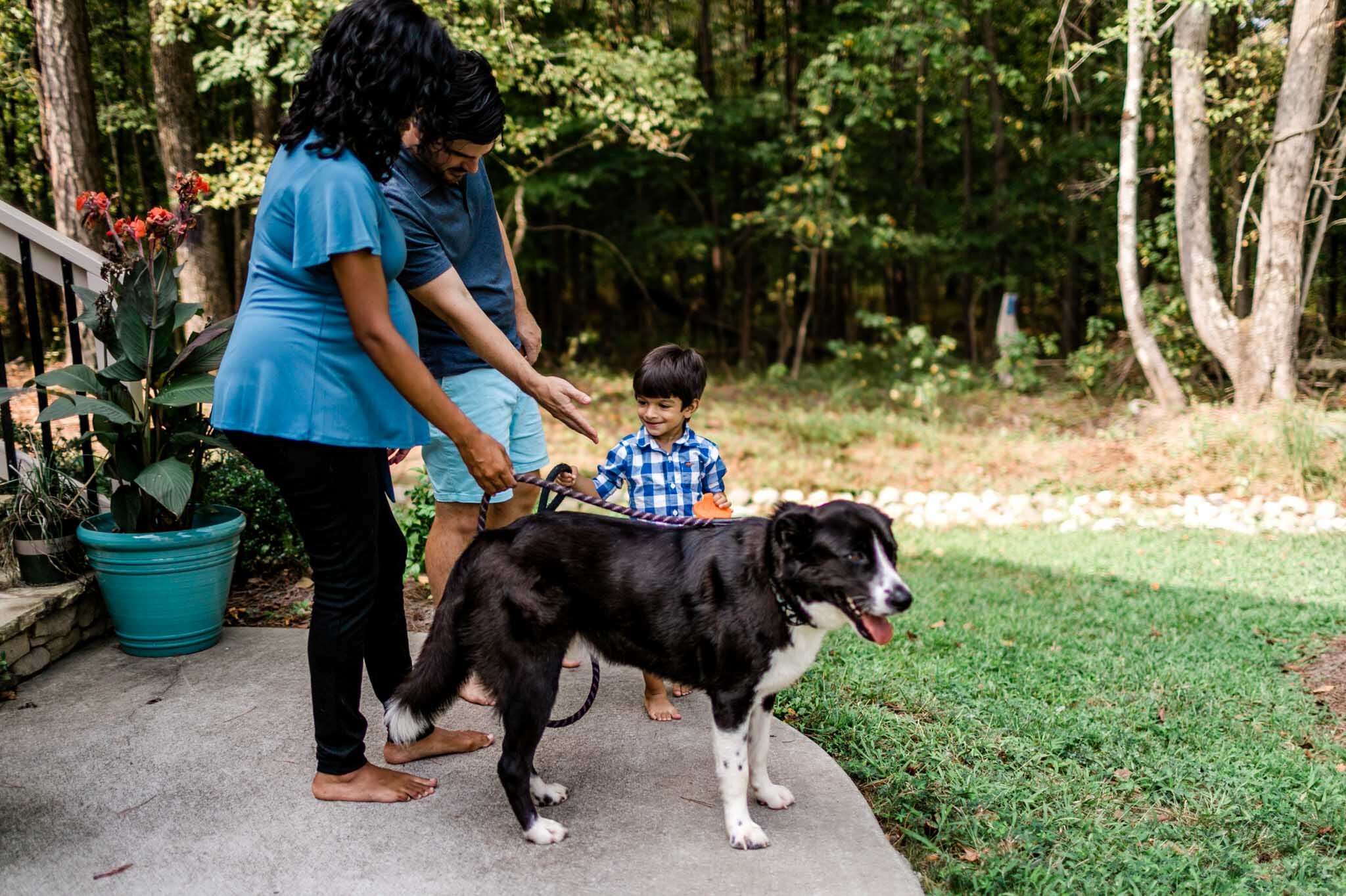 Durham Photographer | By G. LIn Photography | Family outside with dog and laughing