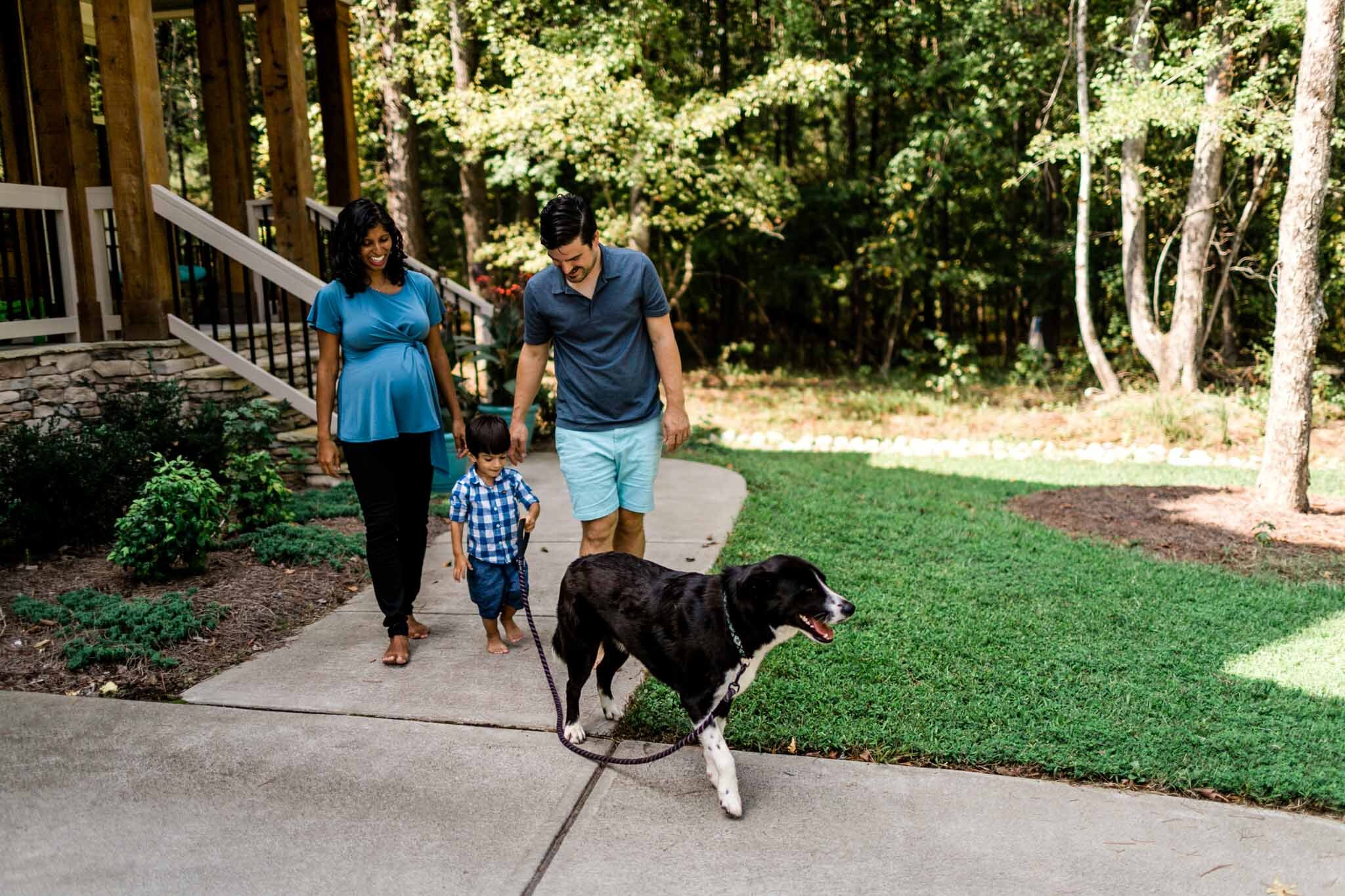 Durham Photographer | By G. Lin Photography | Lifestyle Session at Home | Family walking dog outside and smiling