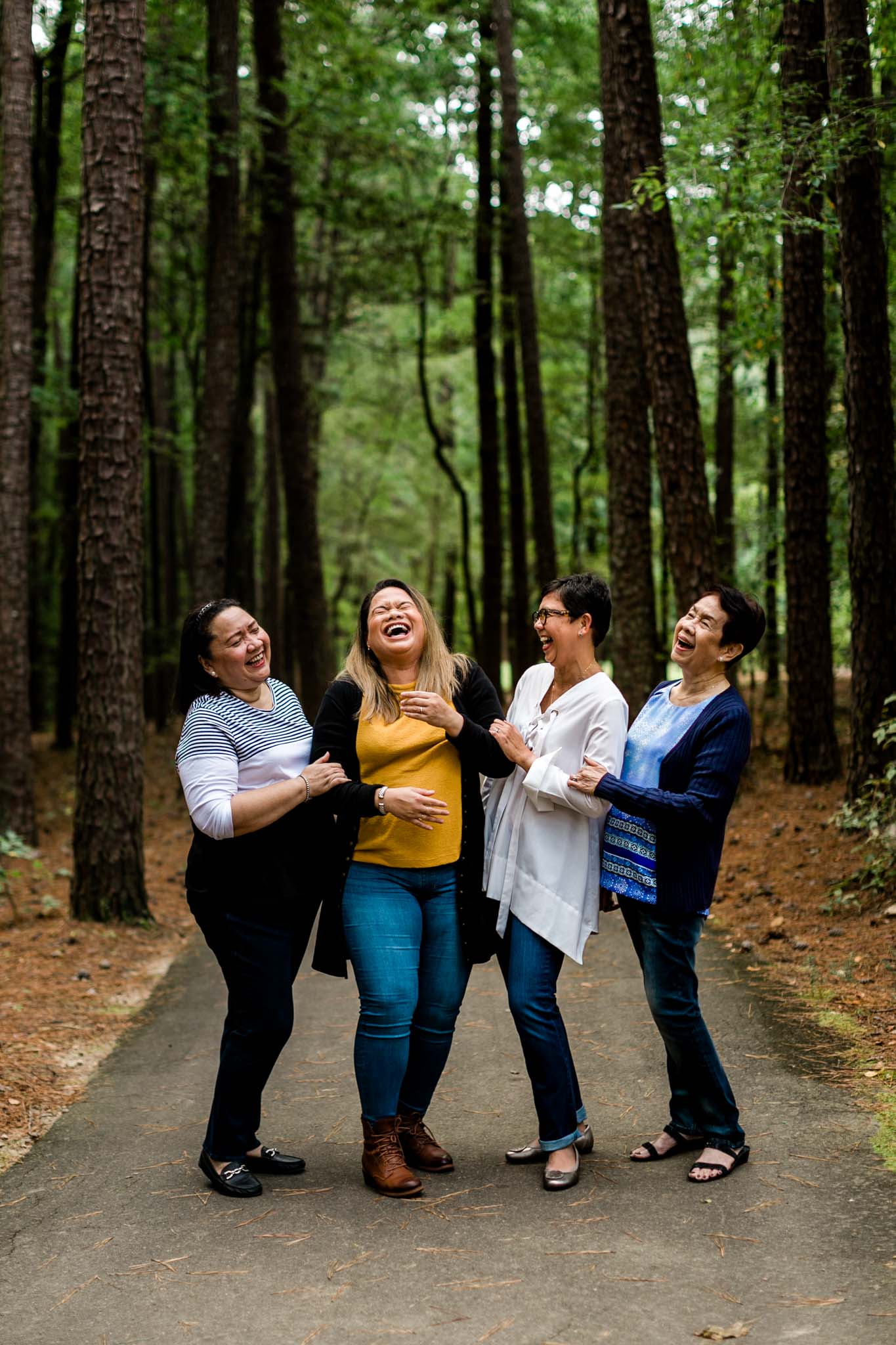 Raleigh Newborn Photographer | By G. Lin Photography | Umstead Park | Outdoor portrait of four women smiling at camera