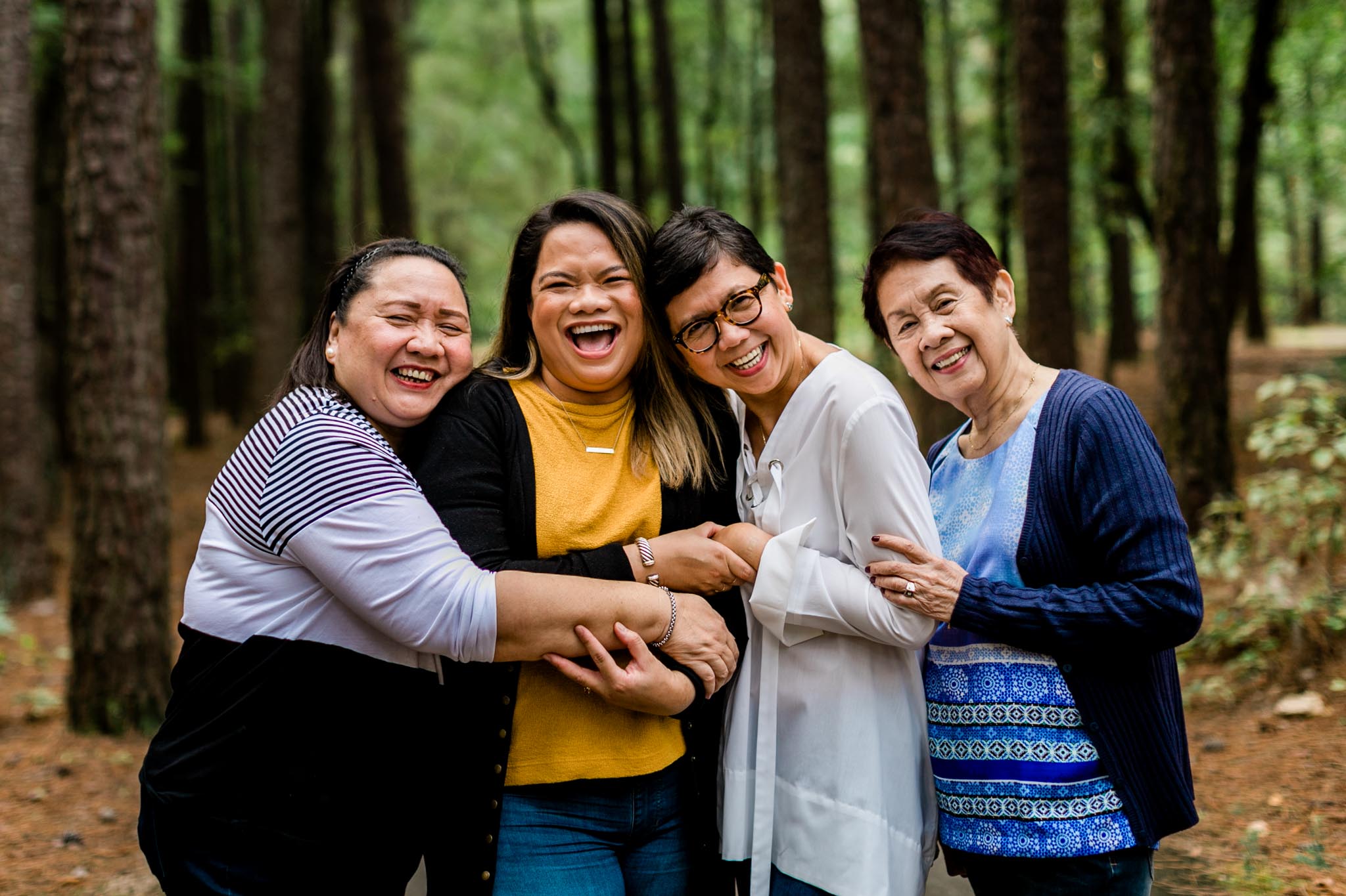 Raleigh Maternity Photographer | By G. Lin Photography | Group of women smiling and laughing at Umstead Park