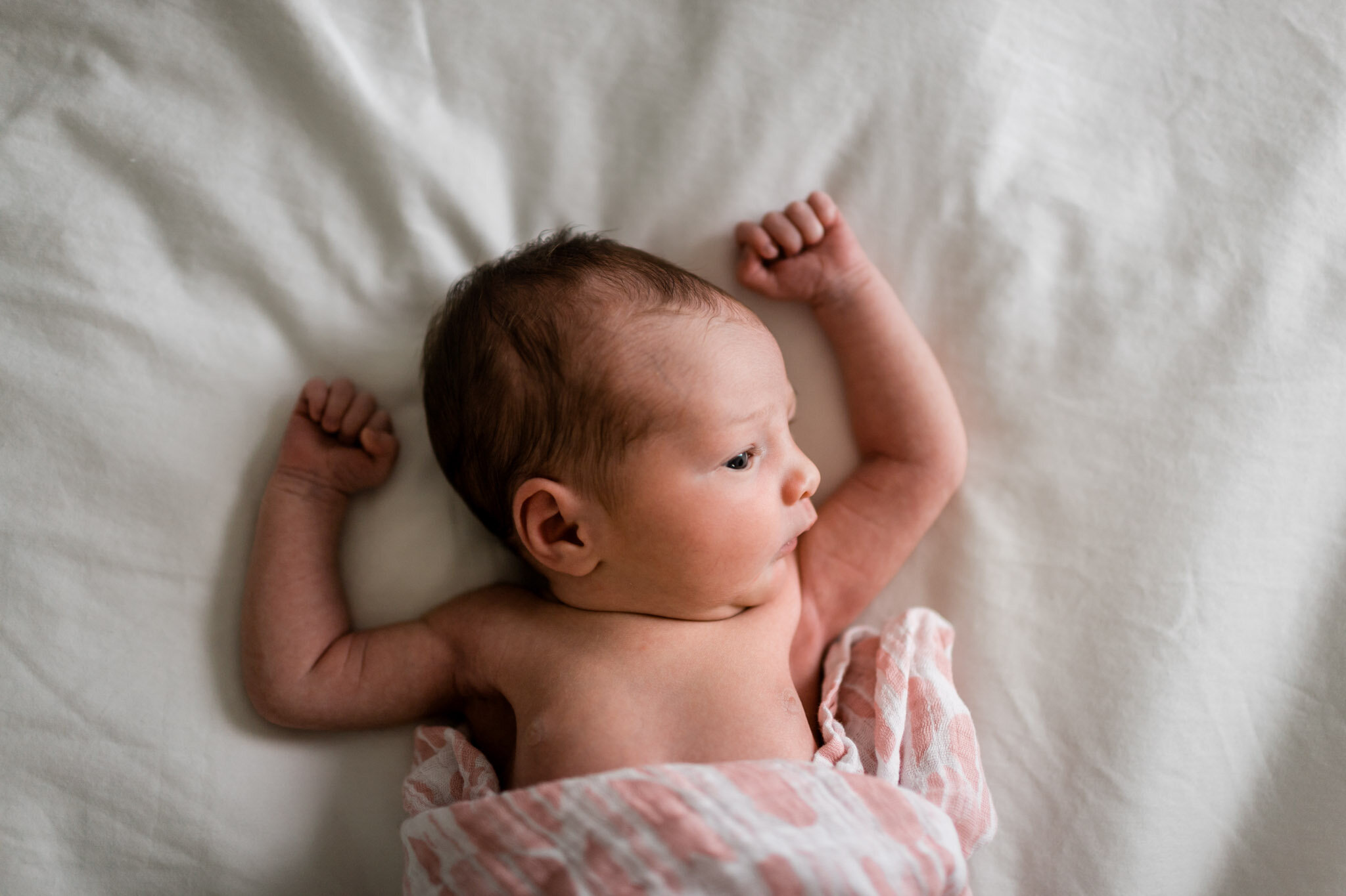 Durham Newborn Photographer | By G. Lin Photography | Baby girl laying on white bed