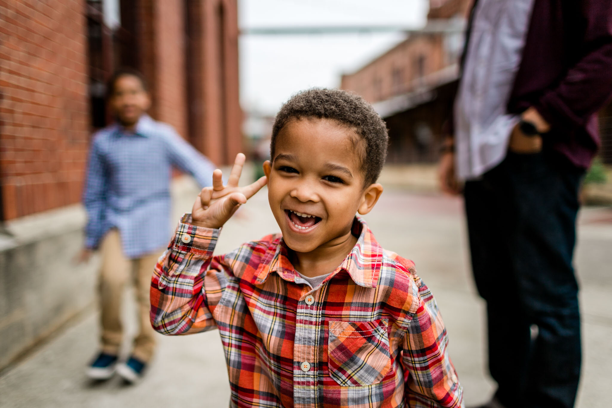 Durham Family Photographer | By G. Lin Photography | Young boy holding fingers up