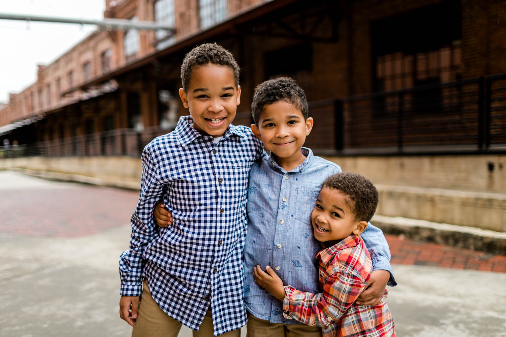 Brothers hugging each other | Durham Family Photographer | By G. Lin Photography