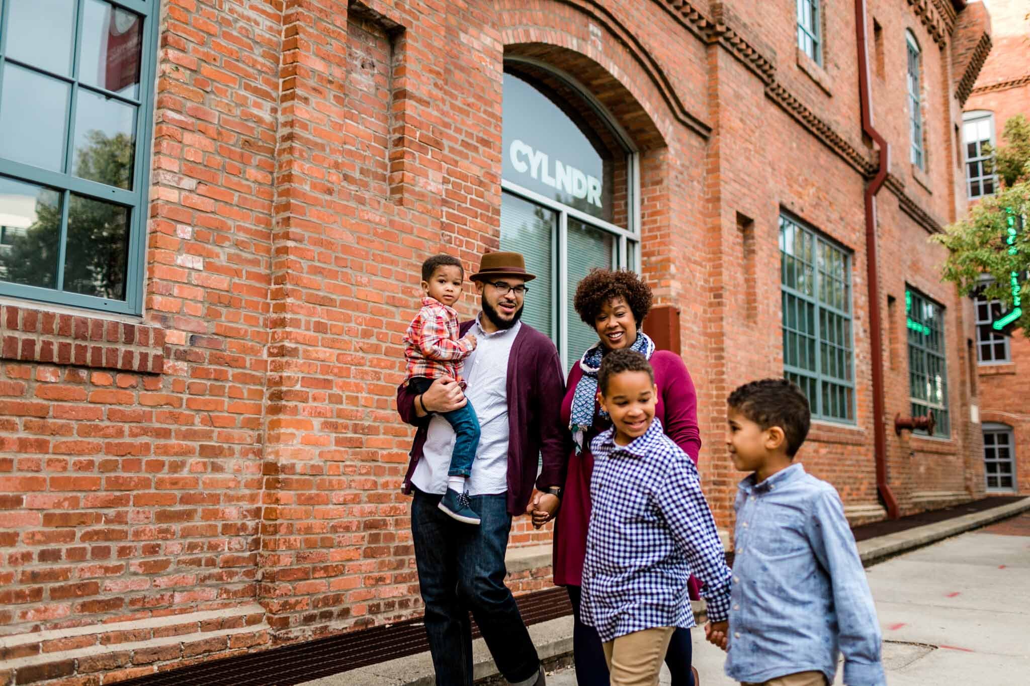 Family walking around downtown Durham | Durham Family Photographer | By G. Lin Photography