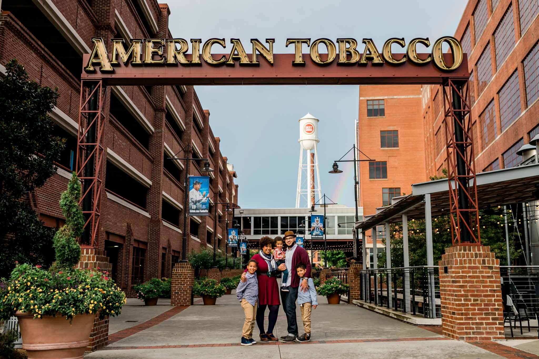 Family portrait at South Entrance of American Tobacco Campus | Durham Family Photographer | By G. Lin Photography