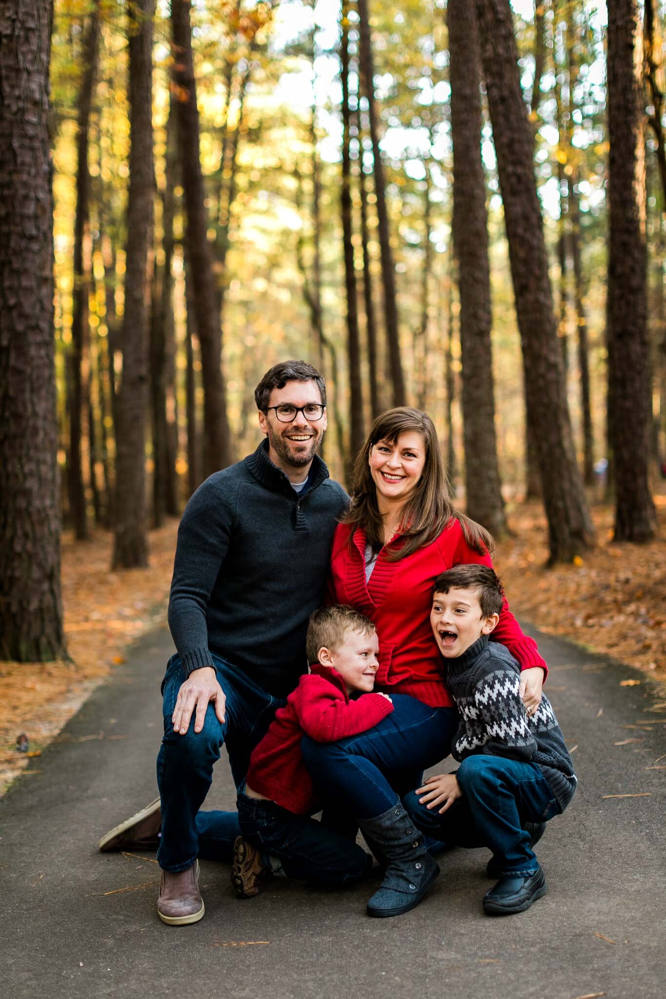 Raleigh Family Photographer | By G. Lin Photography | Candid family photo outdoors at Umstead Park